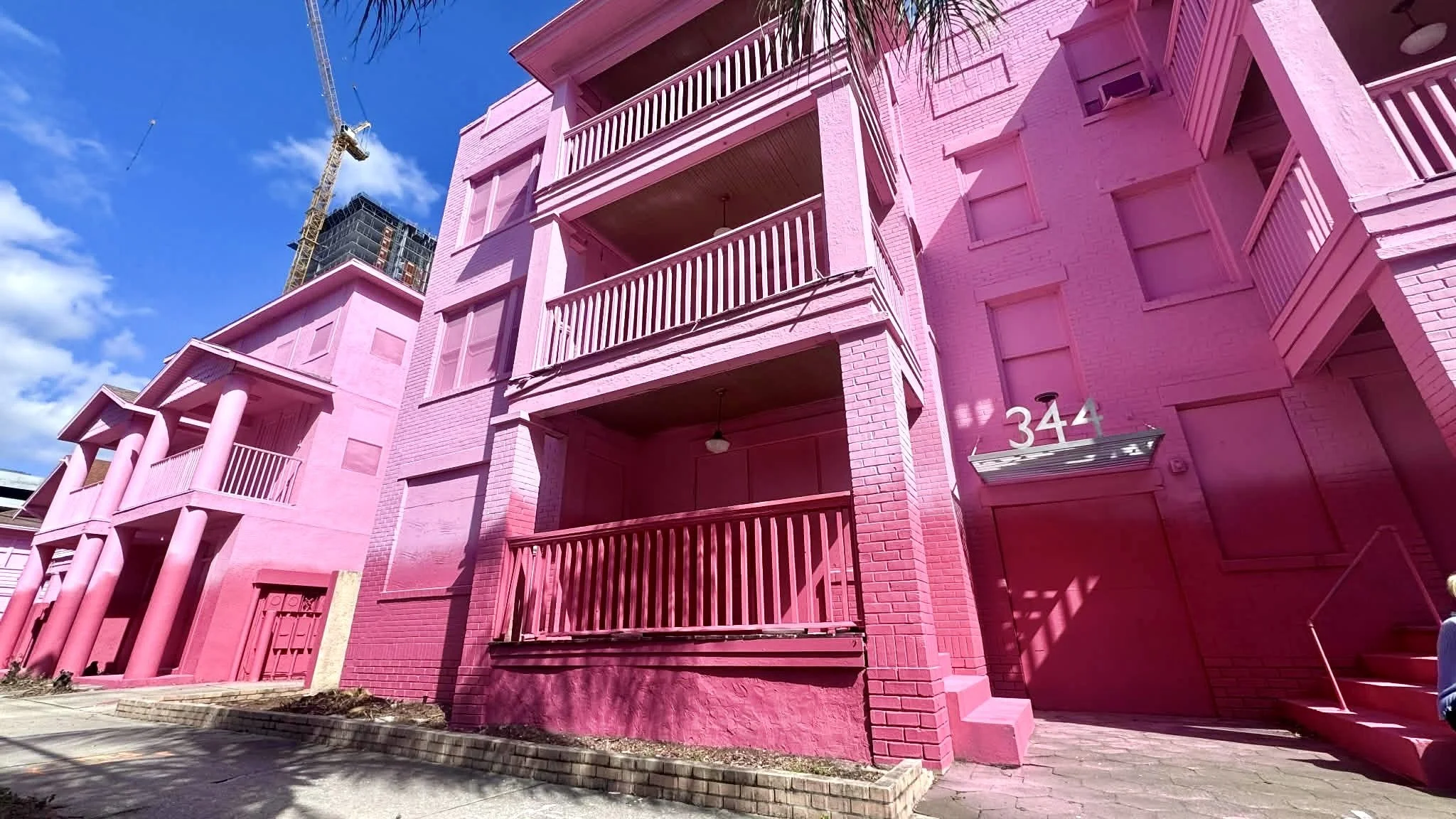 Downtown St. Pete apartments painted pink before demolition makes way for 29-story condo tower