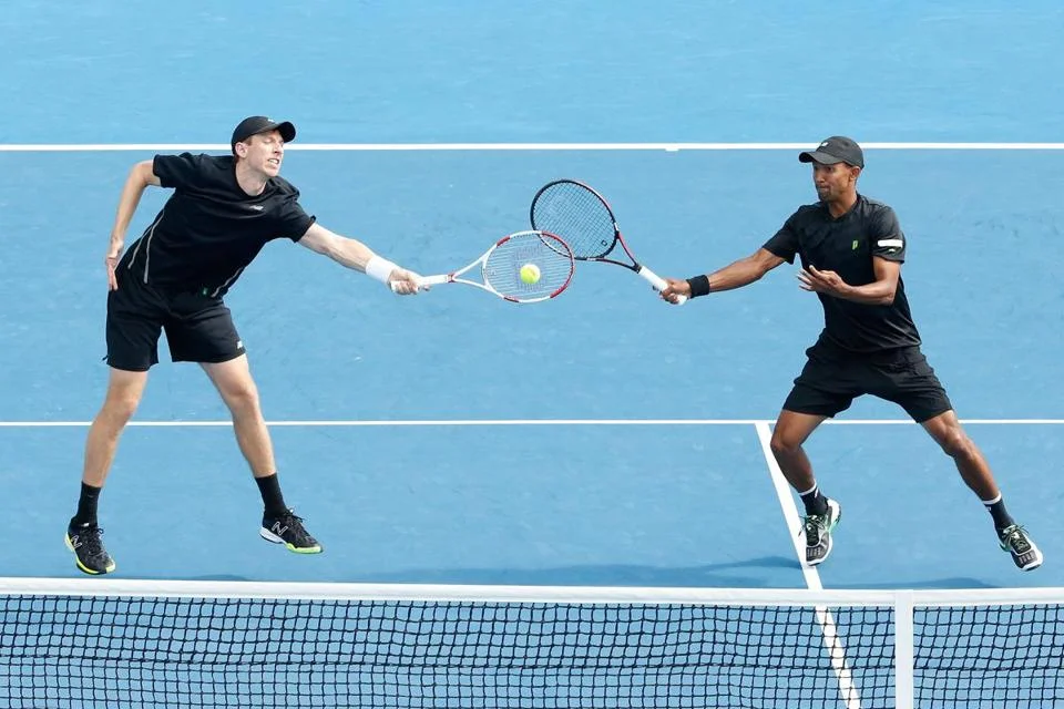 Bostonian Eric Butorac rises up in doubles down under