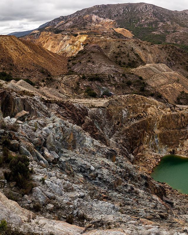 SWIPE RIGHT for full panoramic view!

Iron Blow.
Queenstown, Tasmania | Australia 
Stitched this panorama from 20 different images; Then split the resulting image into three for Instagram. Seemed like a lot of Math!

Queenstown in Western Tasmania an