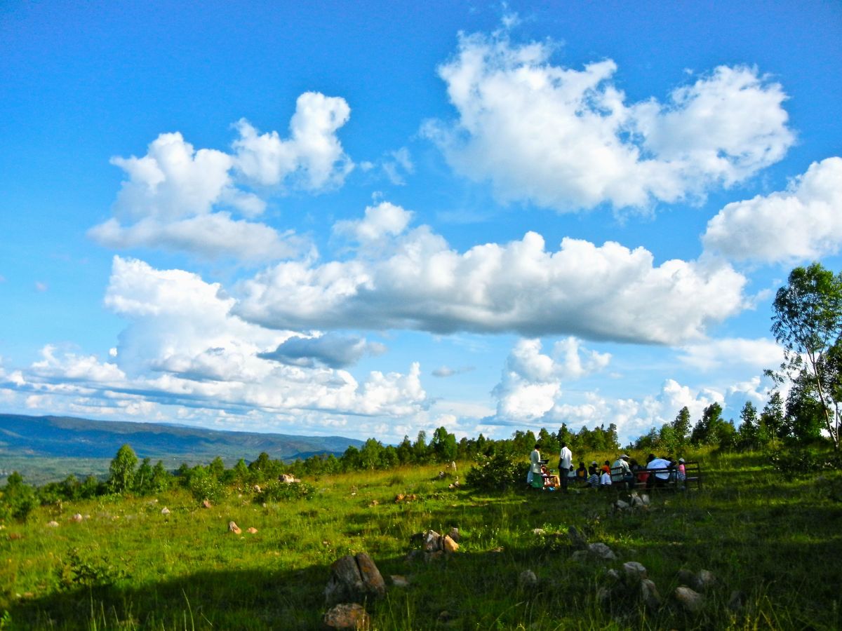  What a beautiful day to be sitting outside in a VSL meeting, in the rocky fields of Rwanda!  Photo by Paul Rippey 