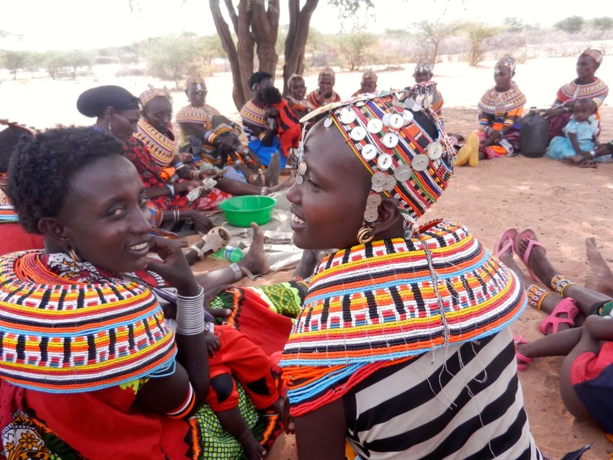  These women meet out in villages where one can drive for hours without seeing another human. The men are often gone for weeks or months to take care of their cattle, and the women stay behind, take care of the kids, and... join savings groups. Thank
