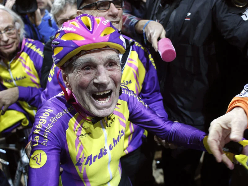 French cyclist Robert Marchand, 105, who set a record for distance cycled in one hour, near Paris in January