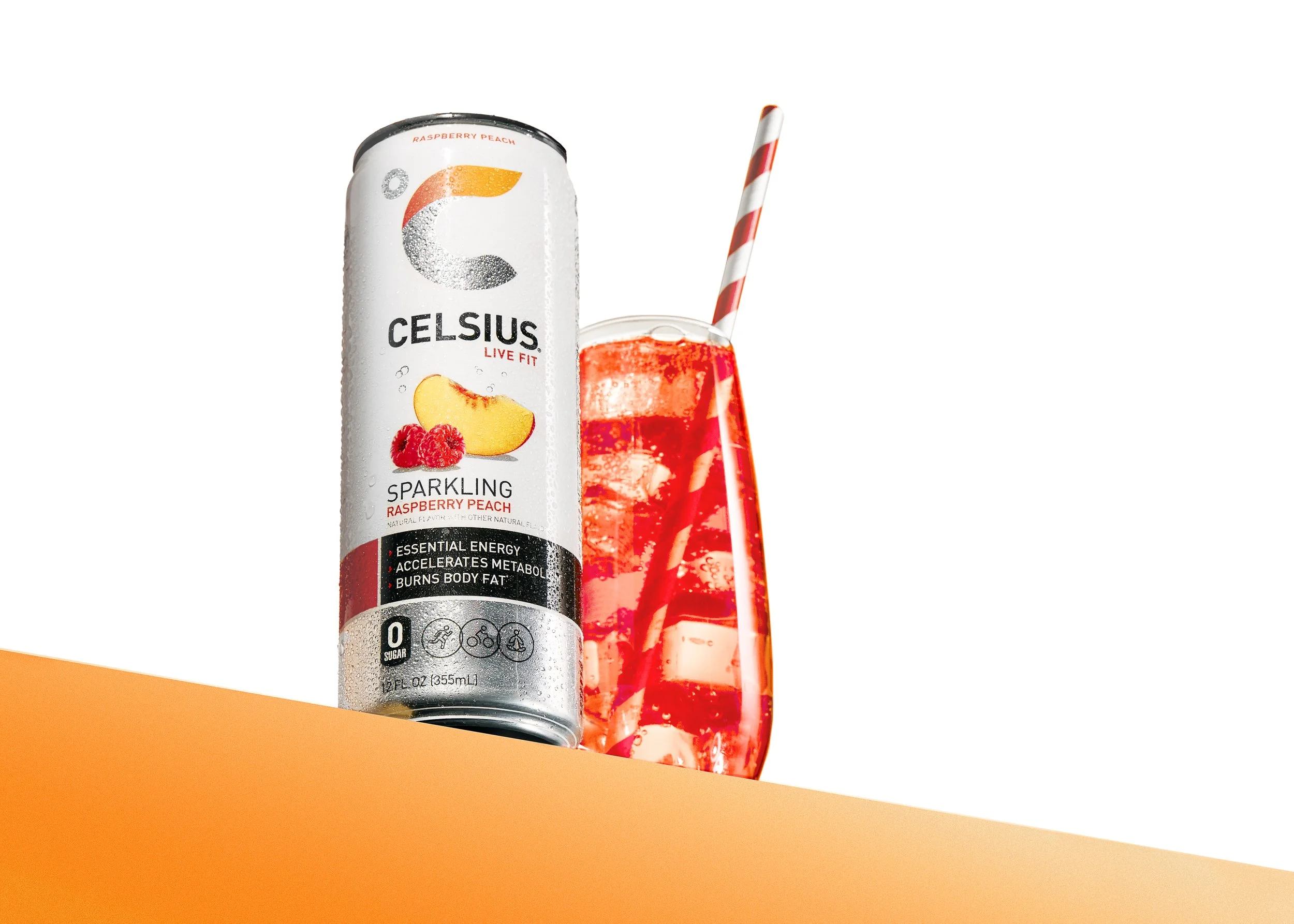 CELSIUS_Sparkling_RaspPeach_glass_r3_v3 copy.jpg