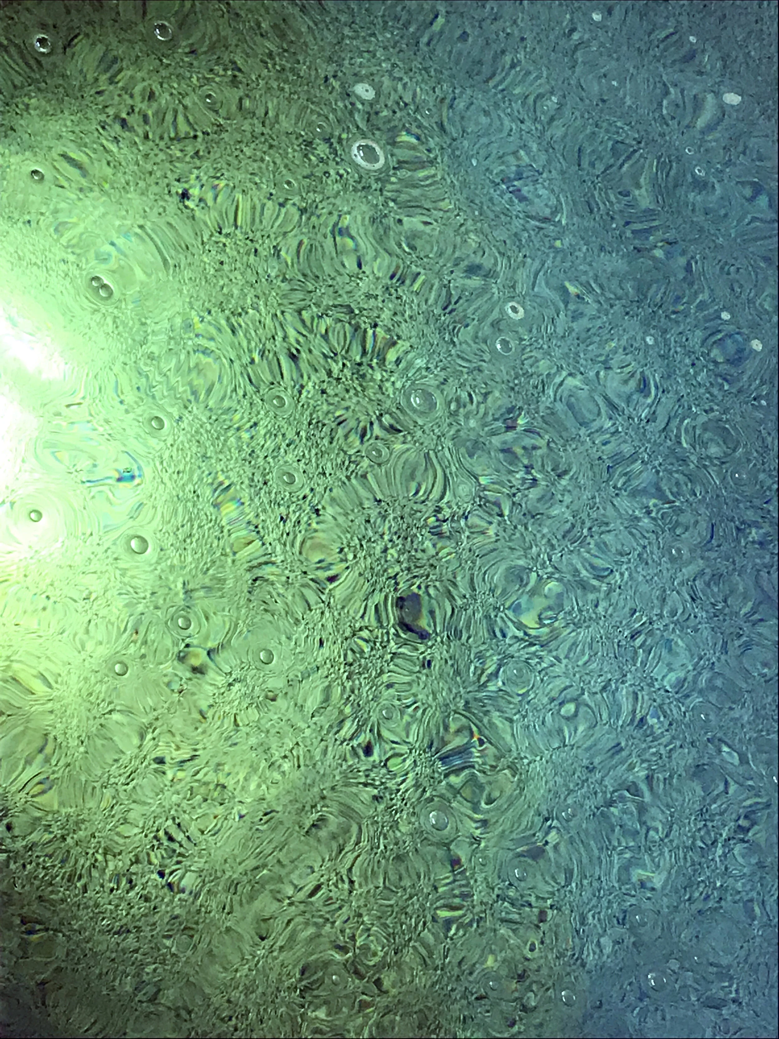 The Surface of The Pool Plays with Light and Is Ever-Changing