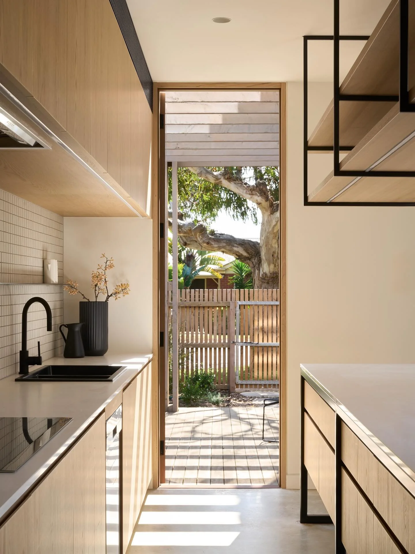 Bridge Road Townhouses

Two townhouses in the heart of Barwon Heads on a 572m2 block in walking distance to the beach and main shopping.
With a restrictive 40% allowable site coverage, we had very little footprint to work with.
To achieve this, the t