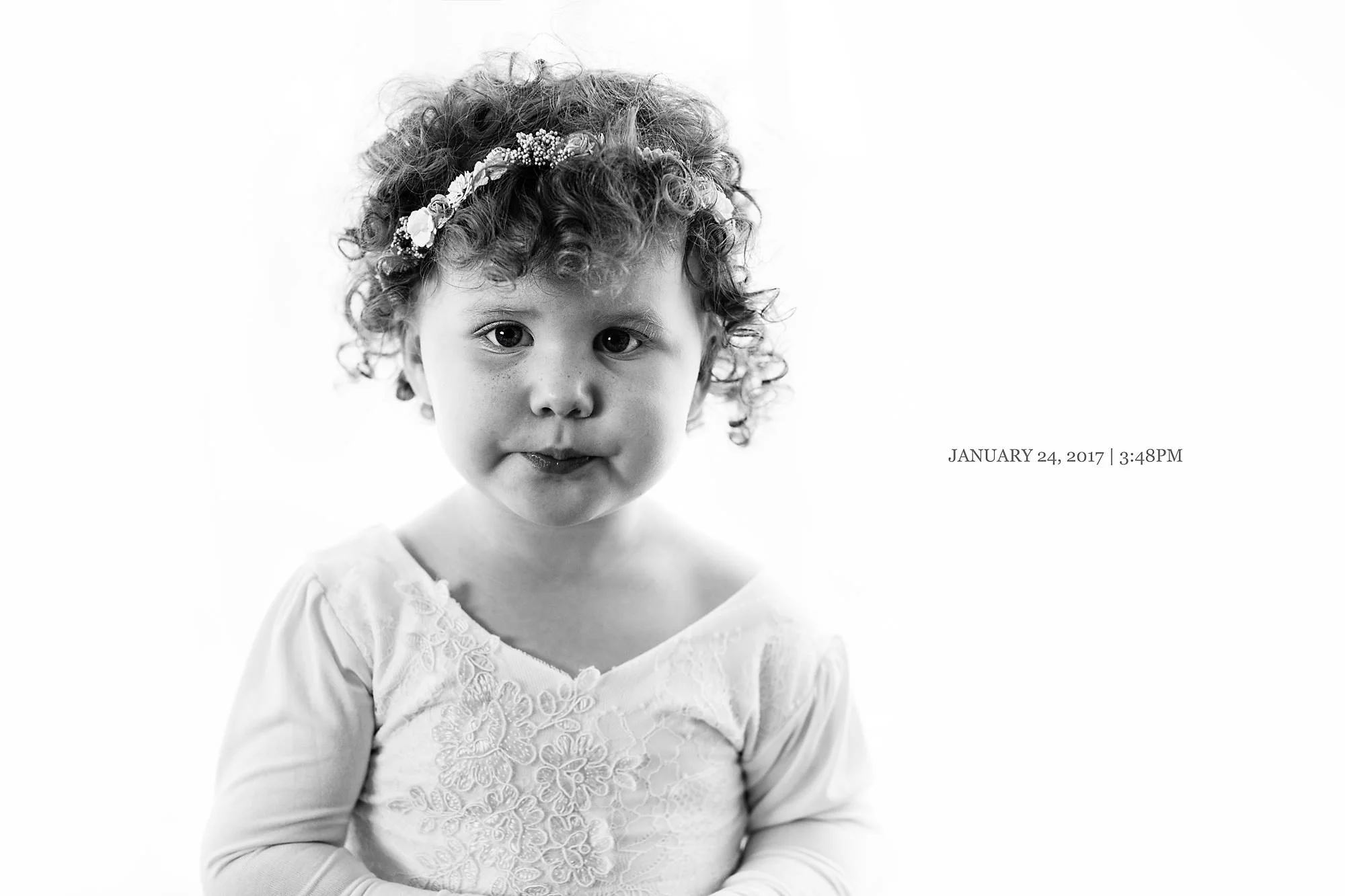 DAY TWENTY FOUR You have tight little cascading curls. When I try to tie them up. They break free, these lively pups. Without a doubt this hair is you. A big fluffy mess of love and glee. So Hazel, let them be wild and free.