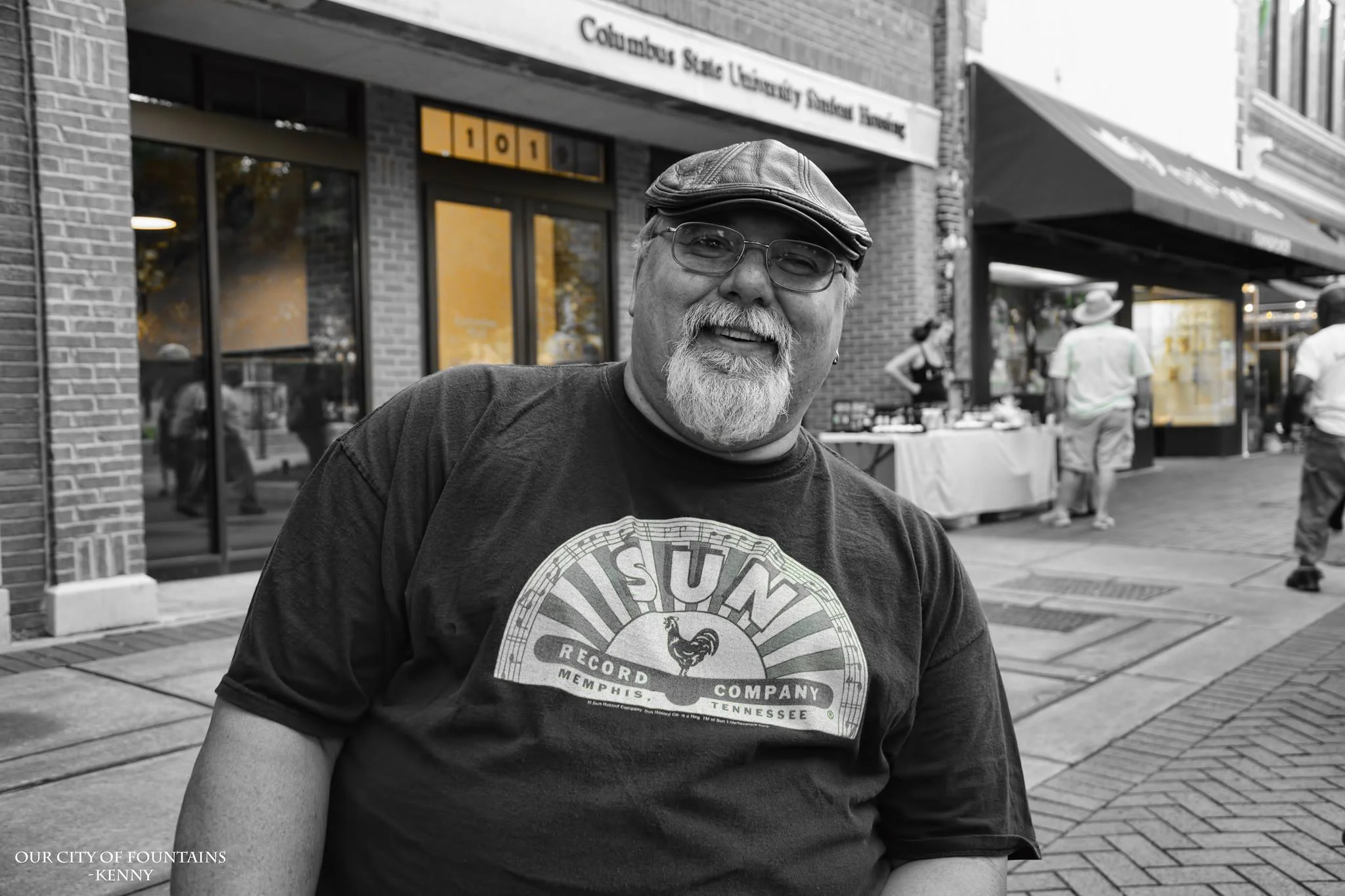 There are hidden gems in every city. People who have contributed their passion and soul into the city they live in for years. Kenny, is surely one of our gems. I’ve known this man for years, and every time I see him…I just can’t help but to smile. A talent filled giant with a heart of gold; it’s people like him that put faith back into humanity for me. This, is his story. “Hey guys, my name is Kenny Miller. People around Columbus, Georgia know me as a musician. I play lead vocals, percussion and harmonica in my band Haywire. I’m also the percussionist, harmonica player in another local band The Breakdowns, the Tom Petty Tribute Band.” “You had a big show lately here in town.” “We had a blast! We played out in the Civic Center two weekends ago. We opened up for the band Big & Rich. Got a chance to meet the guys and hang out. We got a chance to sound really, really good. The sound guys we had working for us were meticulous in getting our sound quality right. They took the time to get all the levels right and all the monitors right. We weren’t just some opening band…it wasn’t your wham-bam, you’ve got your five minutes now get out of here. We got a good sound check so we tore the roof out that sucker. Terri Young…his voice was strong and all the guys in the band…Willie, Kurt, Mike, Emily and Rick…all of these guys were on top of their game that night. We played great songs. We got a great response and we got great reviews, especially from gigsalad.com. We’ve been doing Haywire since ’92. We’ve been around for a long time. We had some personal changes over the years ya’ know? But we haven’t had a lull in our plans since ’92. No more than a couple of months. We are still out there doing our thing and people still seem to show up. “ - You guys have very faithful followers. “Oh we have some of the best fans in Columbus! They’re going to come out to the show. They’re going to hoop and holler. They’re going to make the show great. “