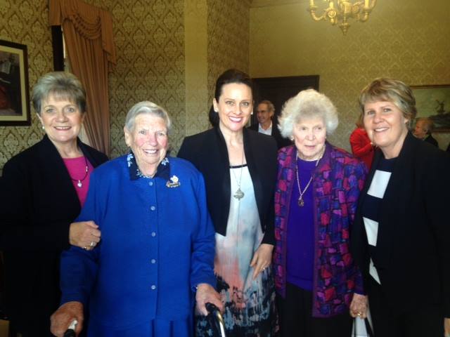 Meg Green, State President of the War Widows Guild assisting one of her widows, Peggy Williams, while also meeting Edna Petfield and Fran Kelly