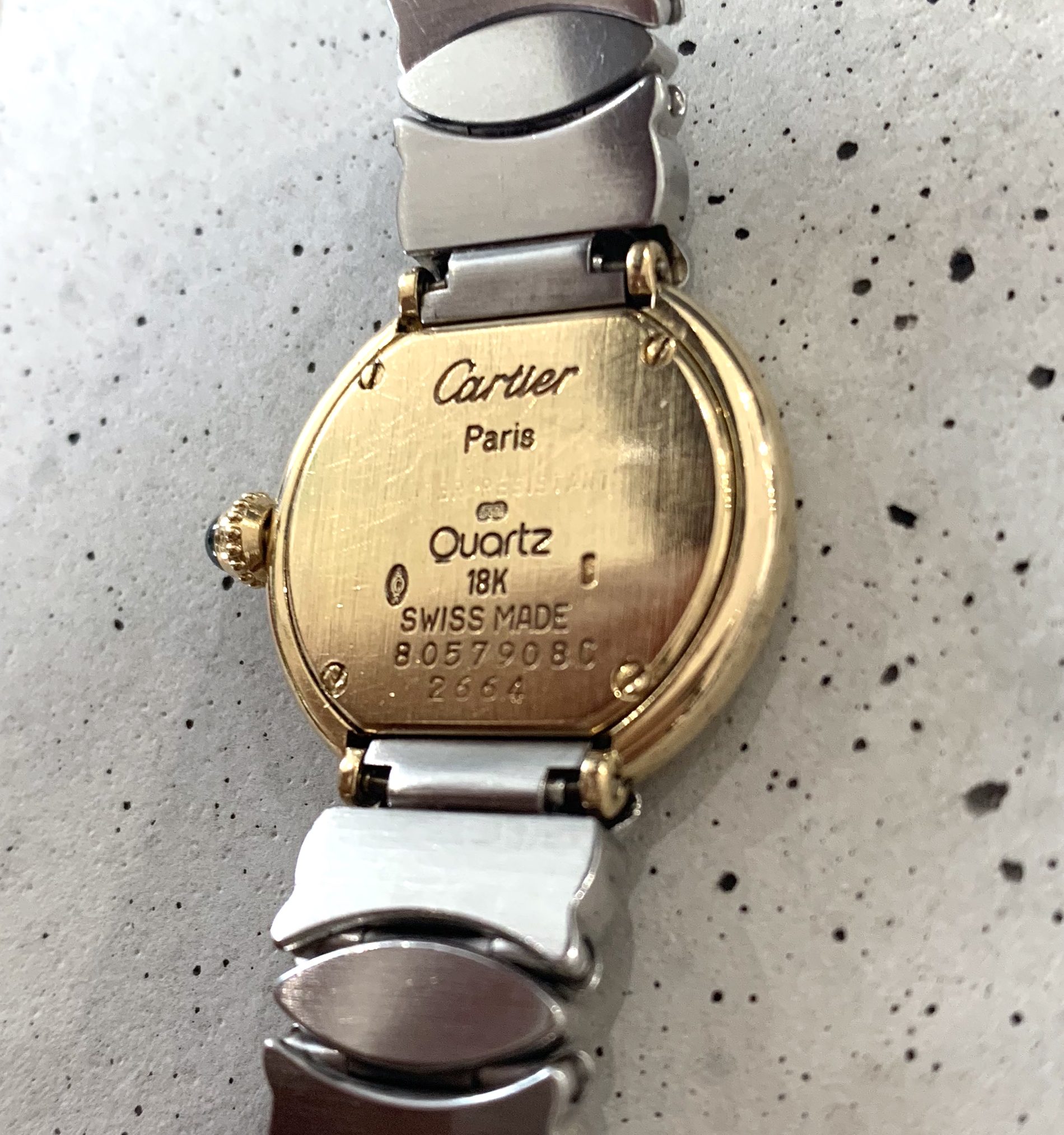 cartier round gold watch