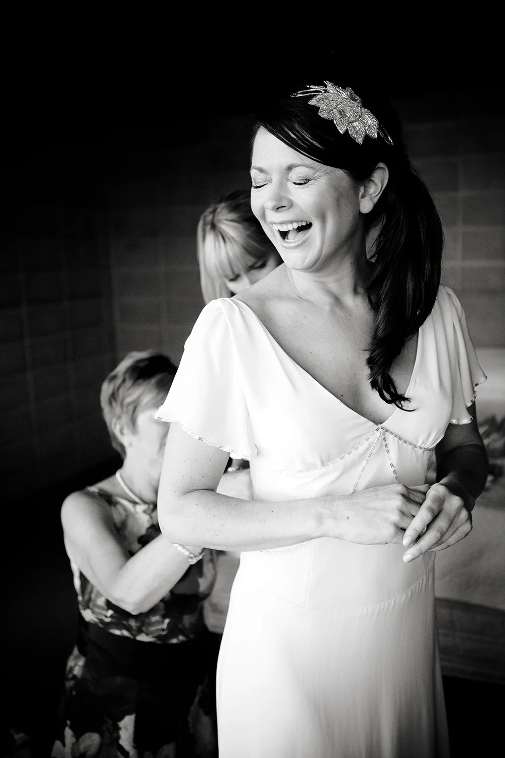 This picture of Penny laughing as she got ready is stuck to the door of my gear room so that every time I gather up my kit before a wedding, I'm reminded what my mission is - to press pause on the most massive moments in a person's life and to capture how people felt in that moment, not just how they looked.