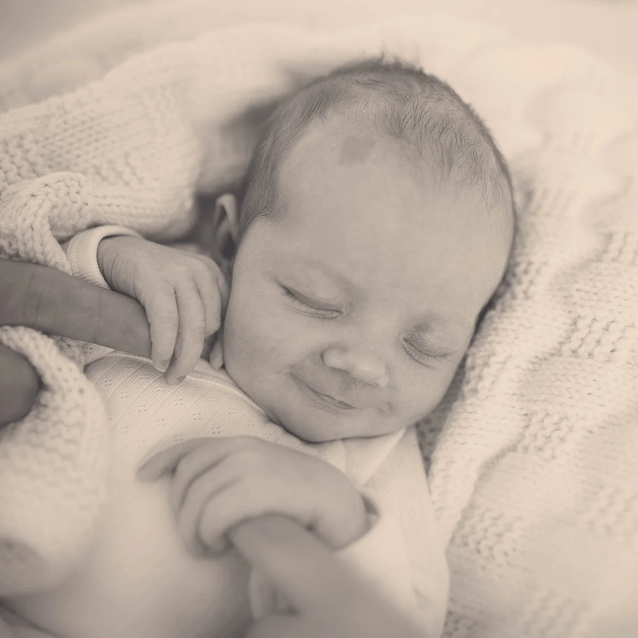 NEWBORN AT-HOME SESSION