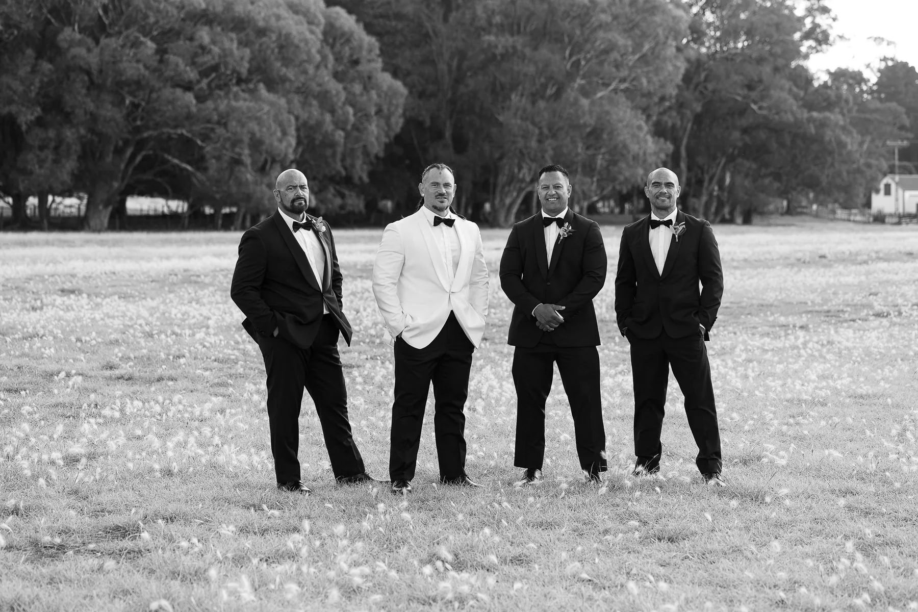 black-and-white-wedding-photo-of-4-grooms-by-eva-bradley-photography