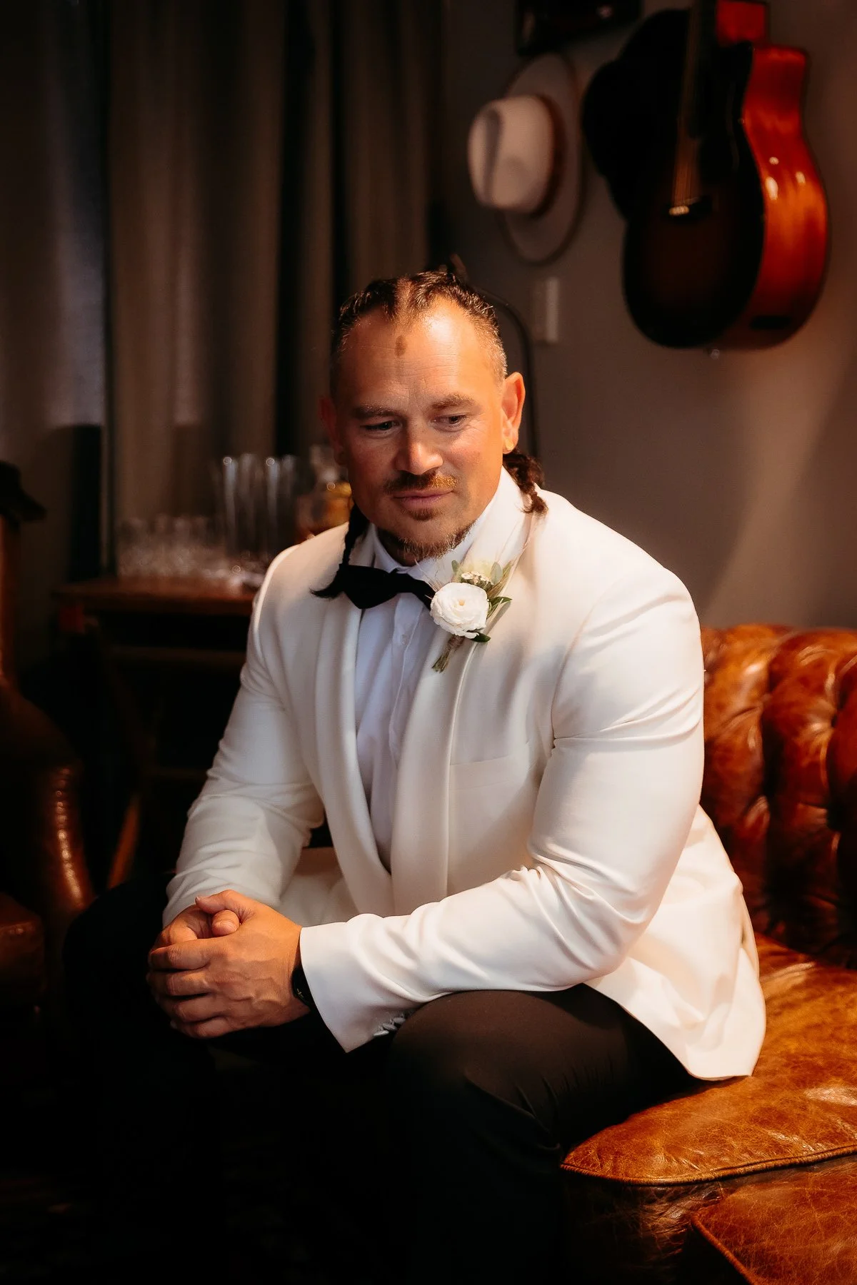 groom-in-white-tuxedo-hawkes-bay-wedding-photographers