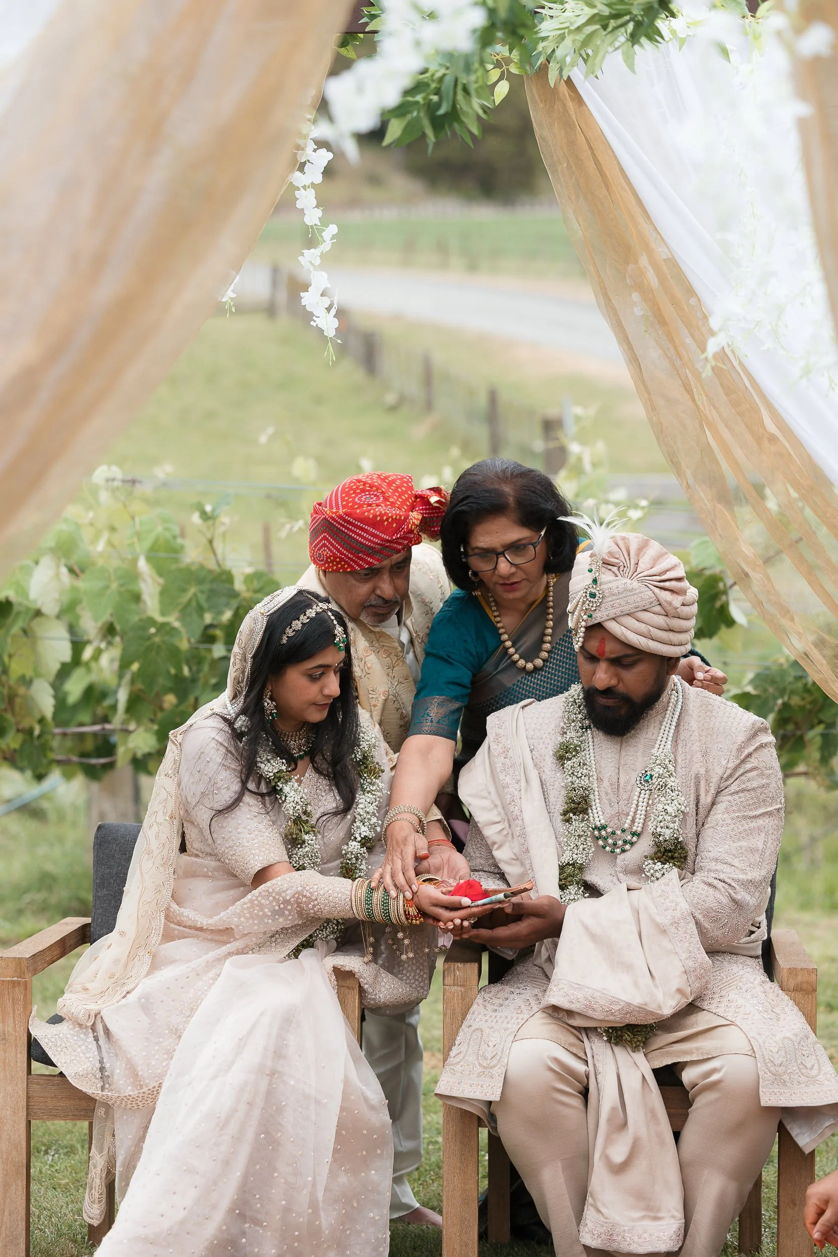 parents-bless-bride-groom-at-pheras-wedding-ceremony