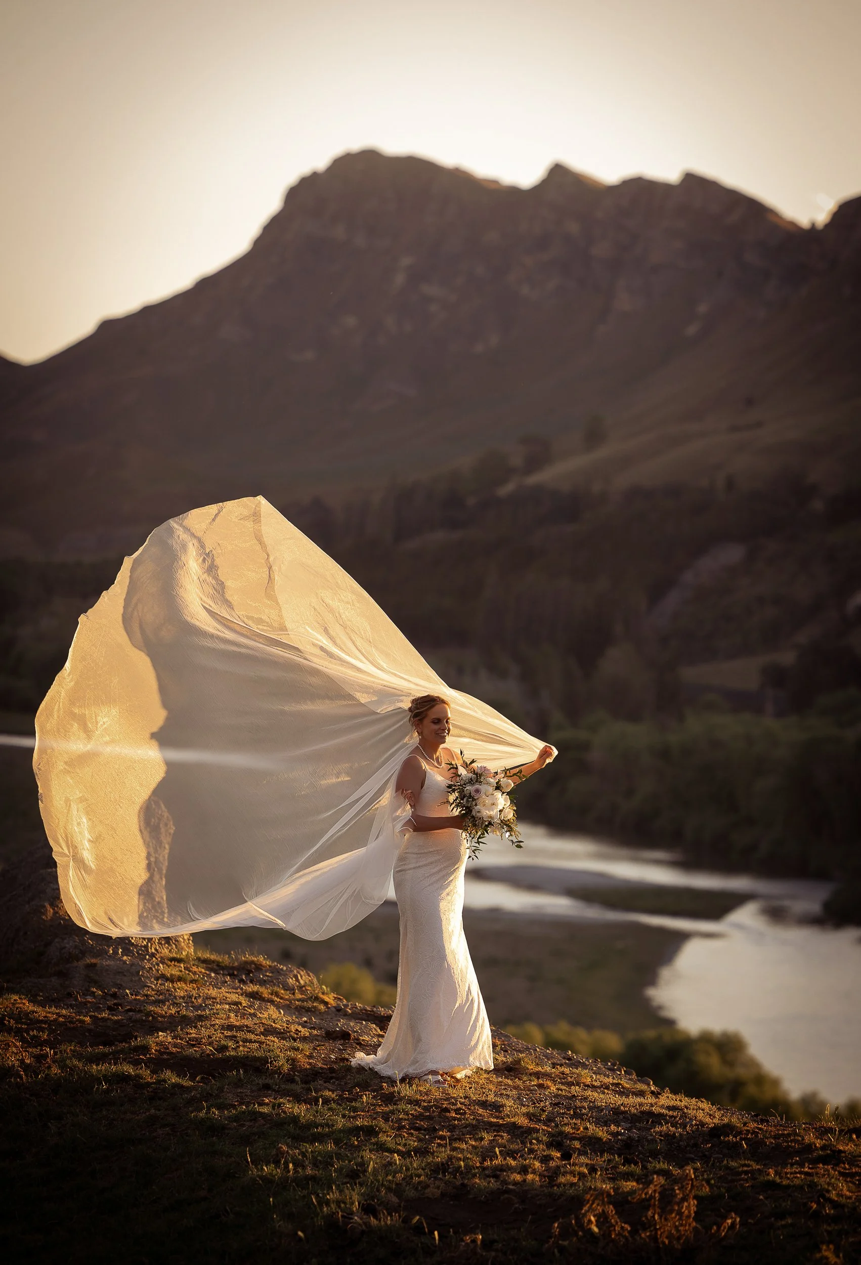 bride-with-veil-at-sunset-hawkes-bay-photographer
