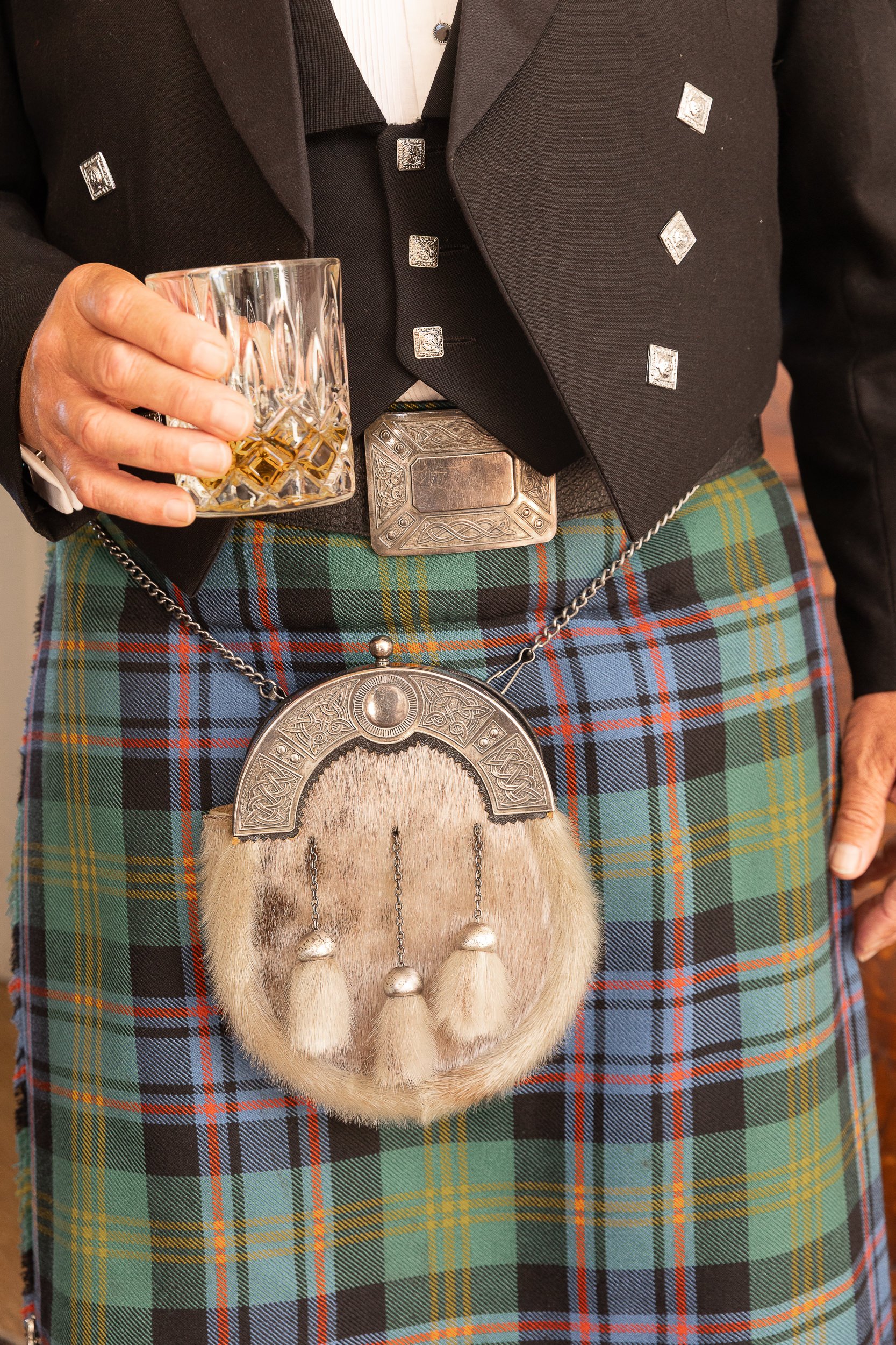glass-of-whiskey-kilt-hawkes-bay-wedding-venue