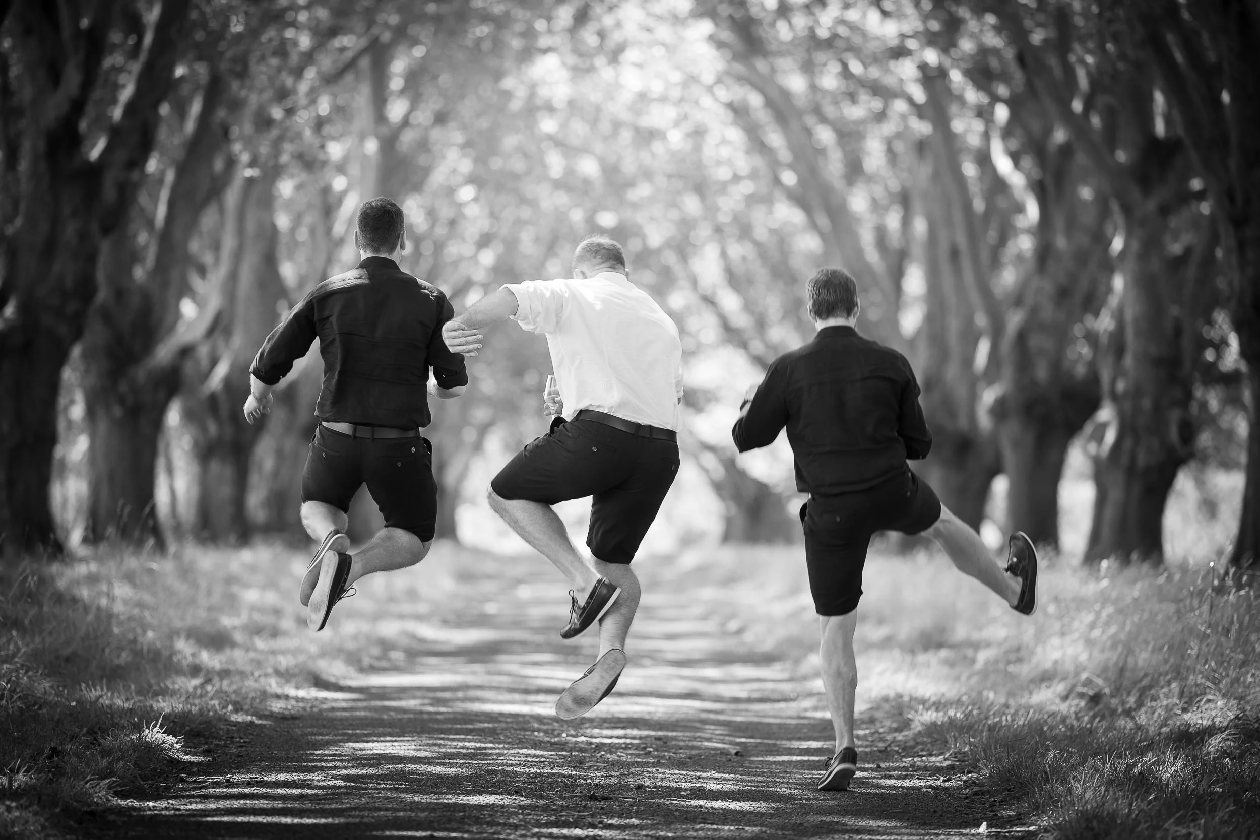 men-dancing-by-napier-wedding-photographer