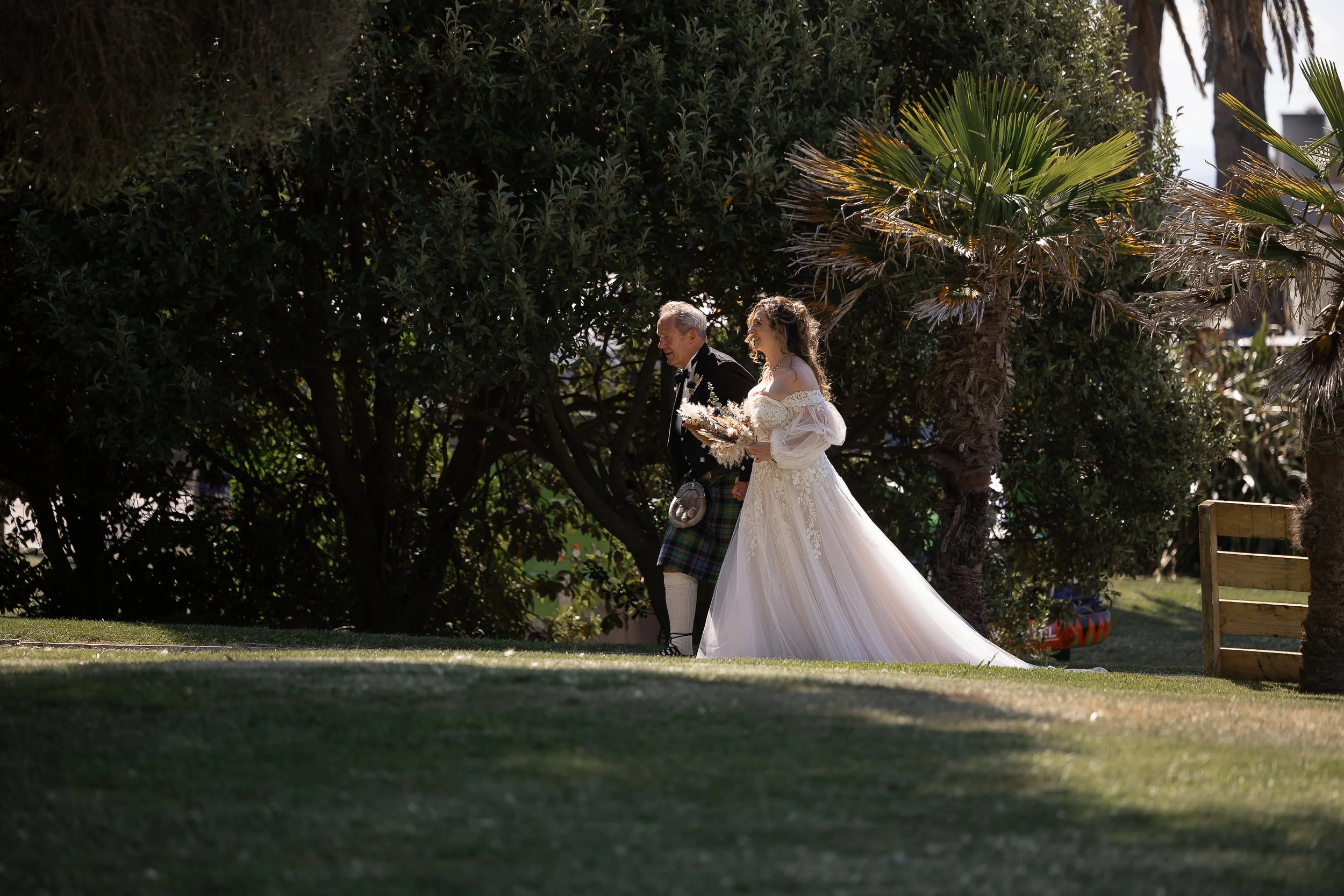 bride-groom-walking-down-aisle-at-hygge-hawkes-bay