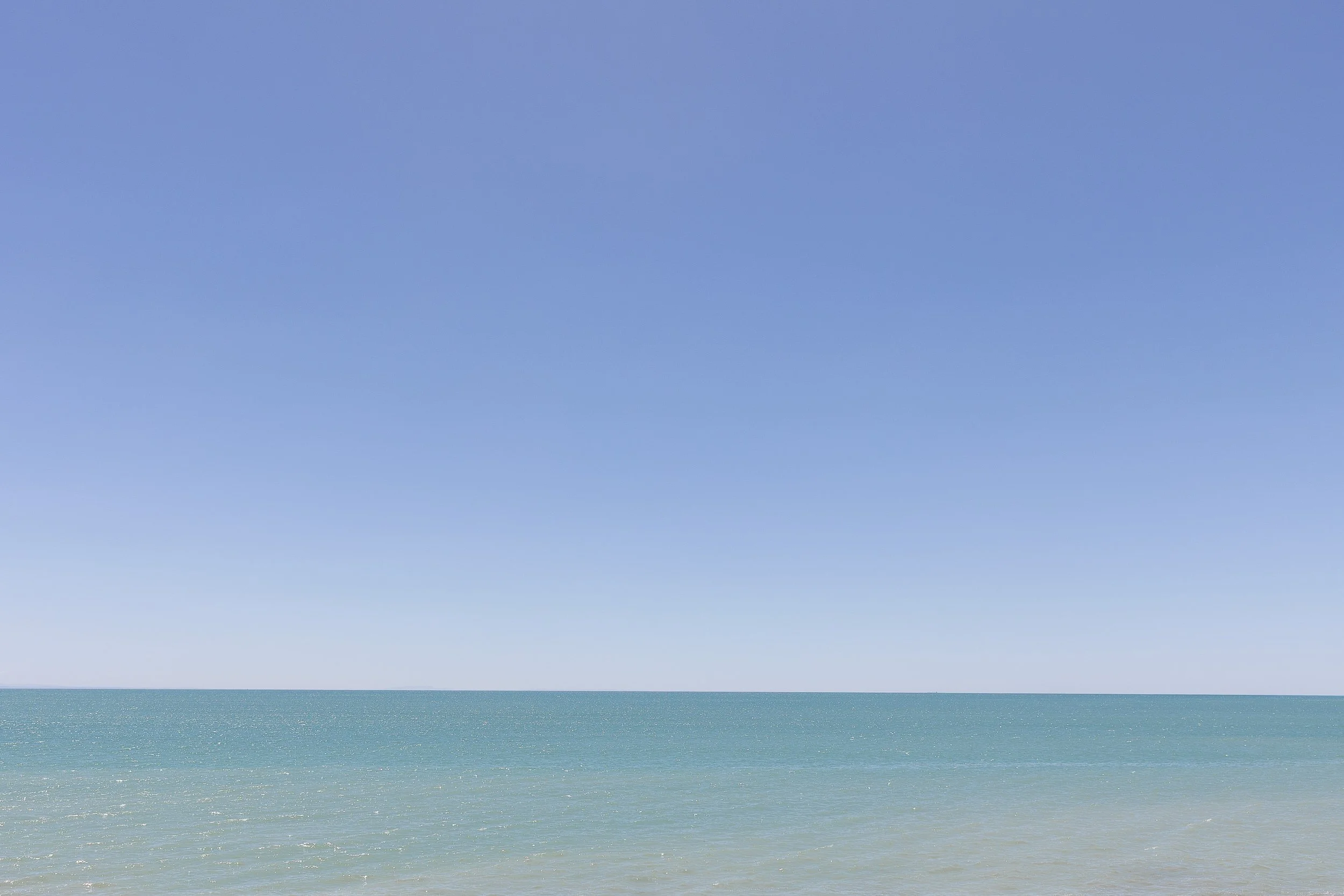 Sea meets sky for a wedding by Hawke's Bay photographer Eva Bradley, based in Napier, nz
