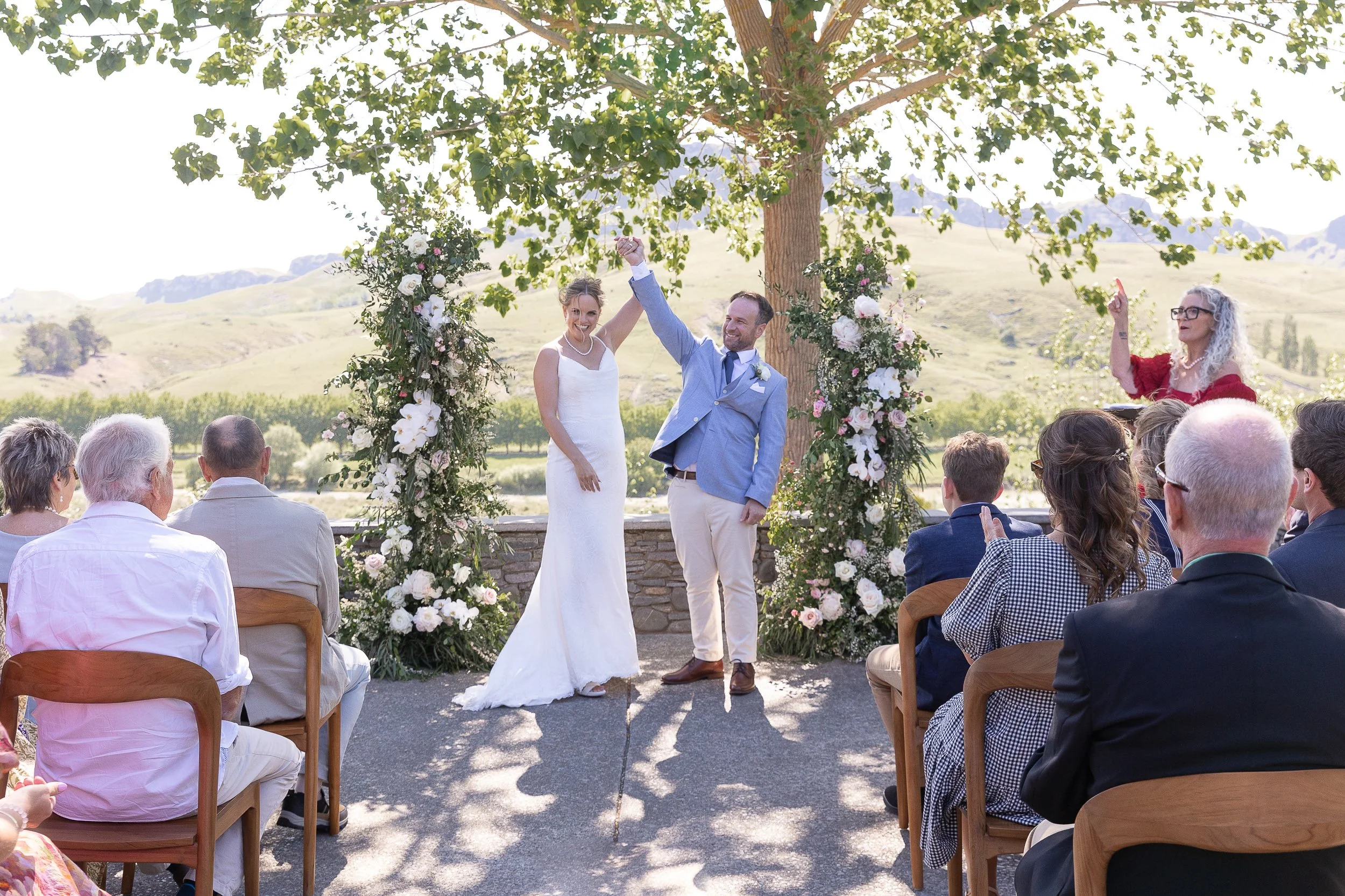 couple-cheers-napier-wedding-photographer