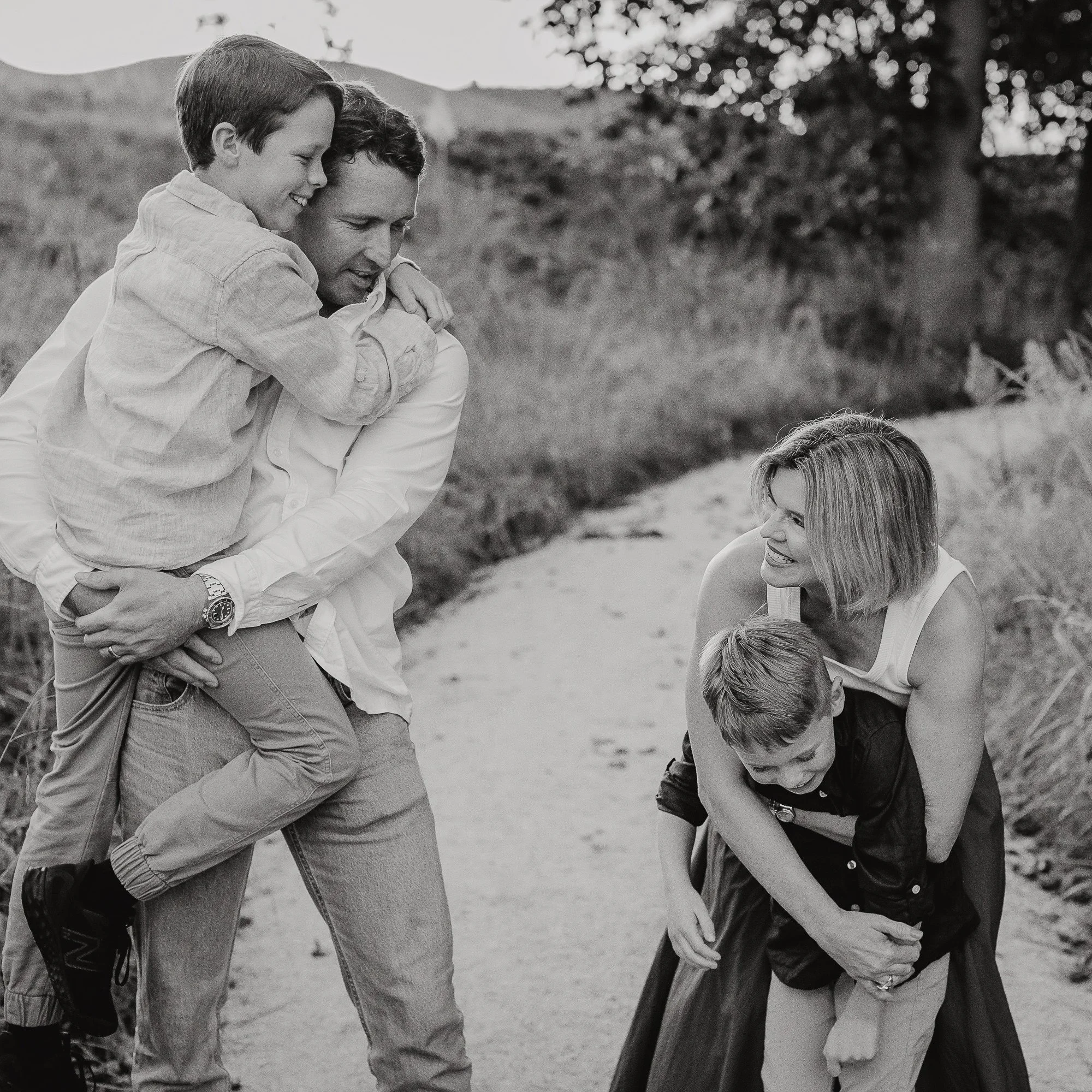 Eva Bradley with her family, husband and two children. Eva is one of the best wedding and family portrait photographers in Hawke's Bay, NZ, and is based in Napier