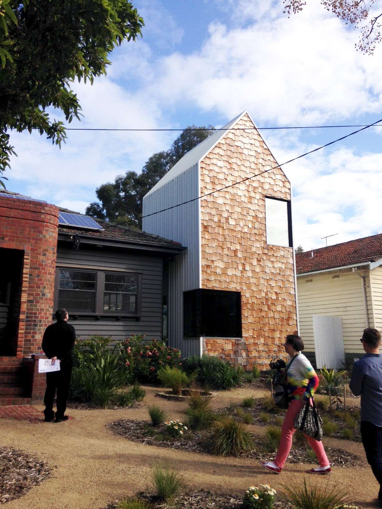 Andrew Maynard - Tower House I would describe this house as cluster of pavilions interconnected by glazed walkways. A clever design that is very inviting and comfortable. It integrates well with the landscape and is a lot of fun.