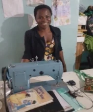 Bernadette teaching sewing