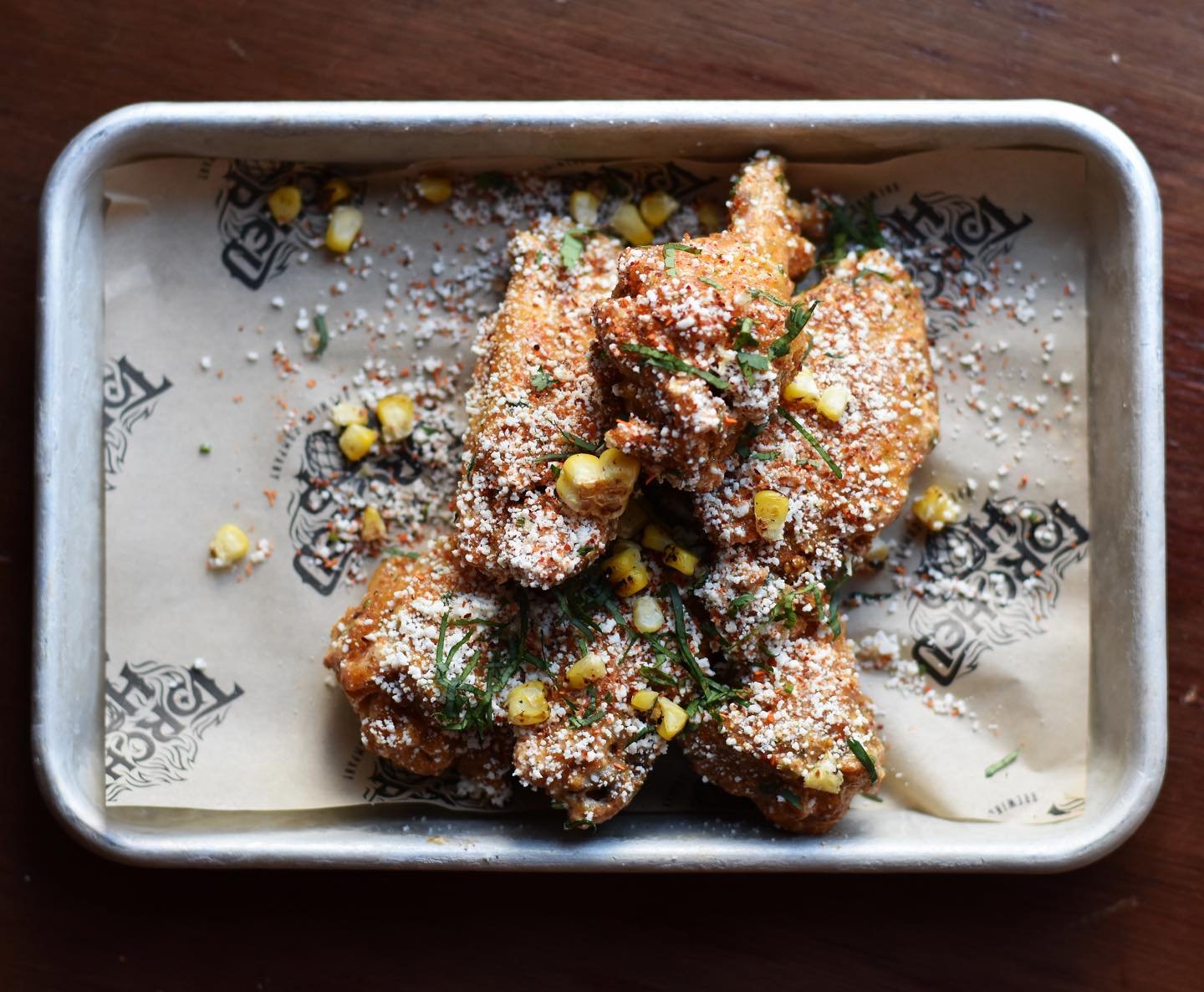 Wing Wednesday + Cinco de Mayo = Elote Wings 

These wings are tossed in our house Elote Sauce then topped with Adobo and Tajin, Roasted Corn, Cotija Cheese, and Cilantro. 

6 Wings + Fries + Beer = $13
10 Wings + Beer = $14