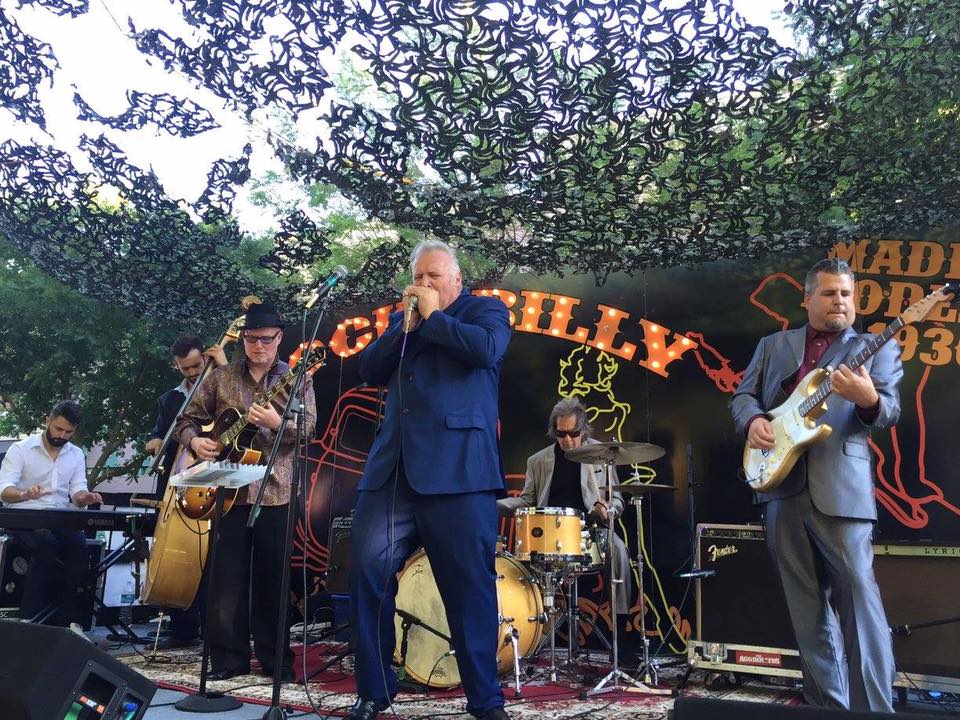 As a co-founder (w/ brother Bill Clifton) of Fresno's The MoFo Party Band, John Clifton has solidified himself as one of Central California's most in demand Blues frontmen since he started in the late '80's. His from the gut vocal and harmonica presence and high energy performances have captivated audiences worldwide. Hitting the road hard since the early days and performing over 150 dates a year, John regularly tours in the U.S. and has headlined some of the most well-known venues and festivals throughout Europe such as the Beersel Blues Festival in Belgium, and the Blues Express and Polish Boogie Festivals, both in Poland. He has also electrified audiences on festivals and in venues throughout the islands of New Zealand and Fiji! 