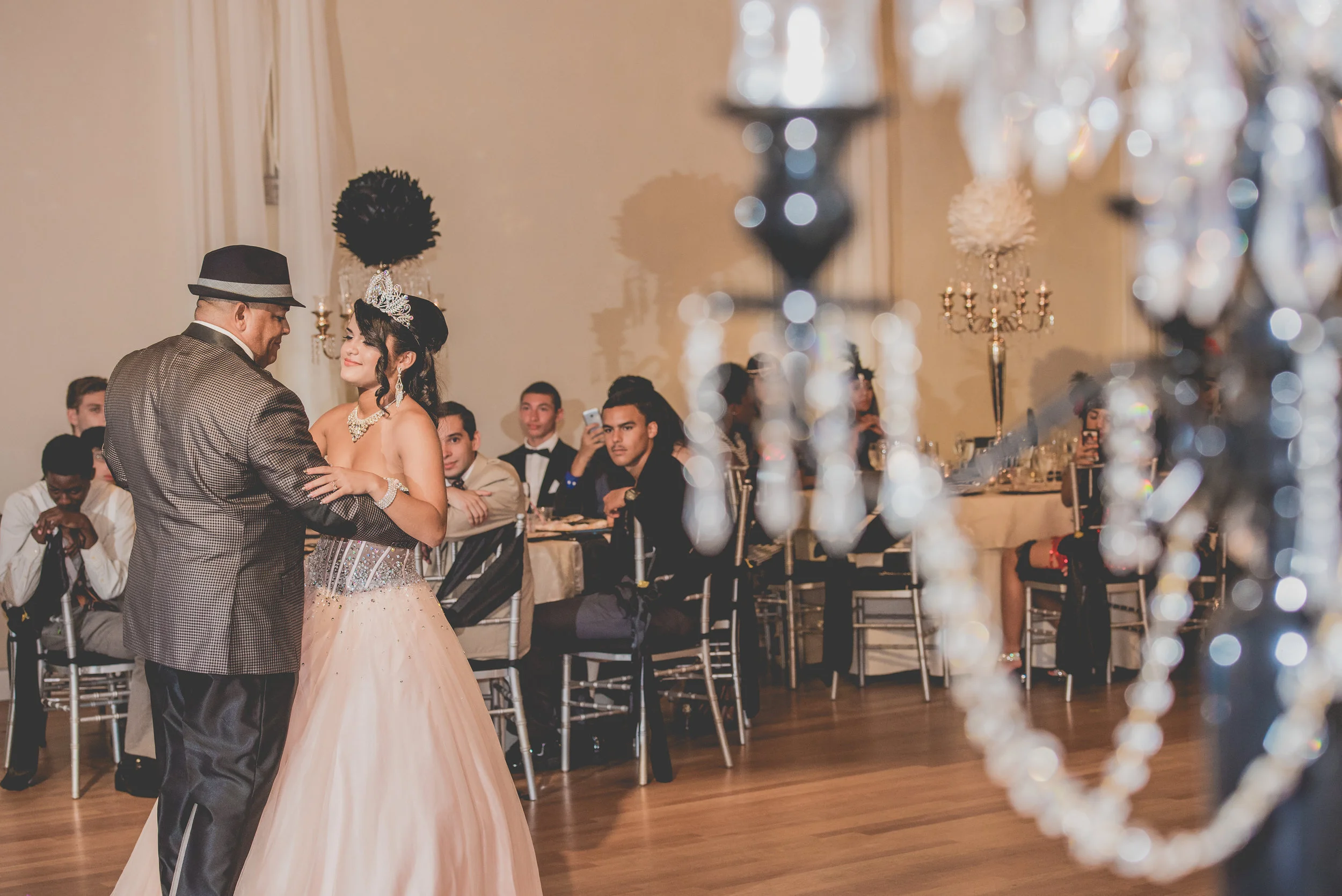 Marisol and her father dancing