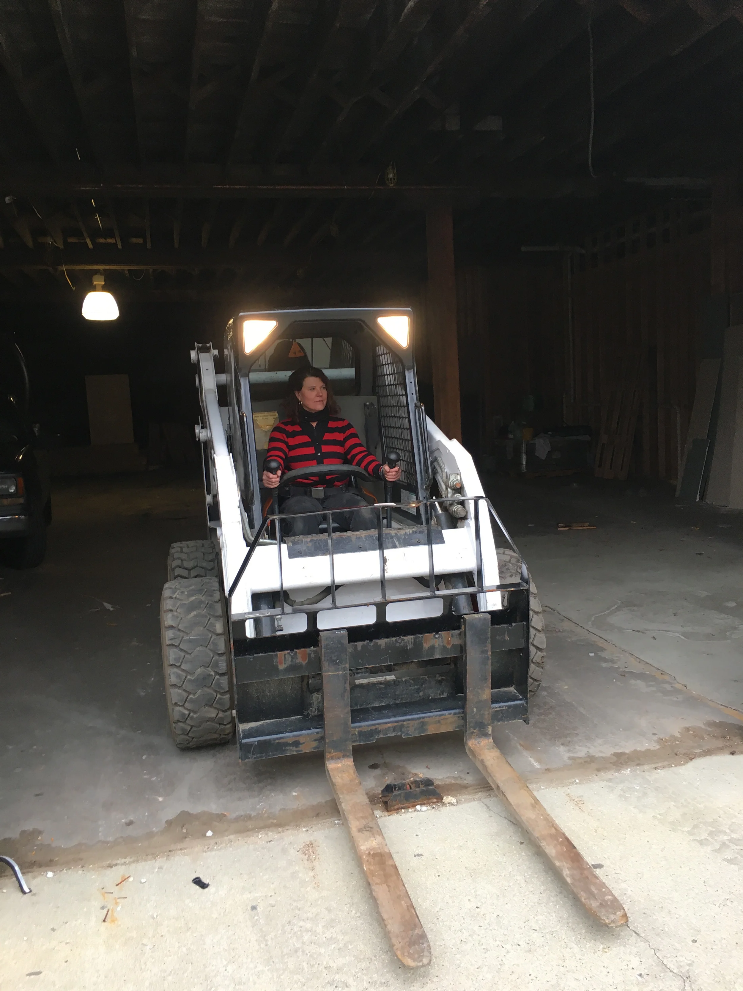 I had to learn to drive a bobcat!