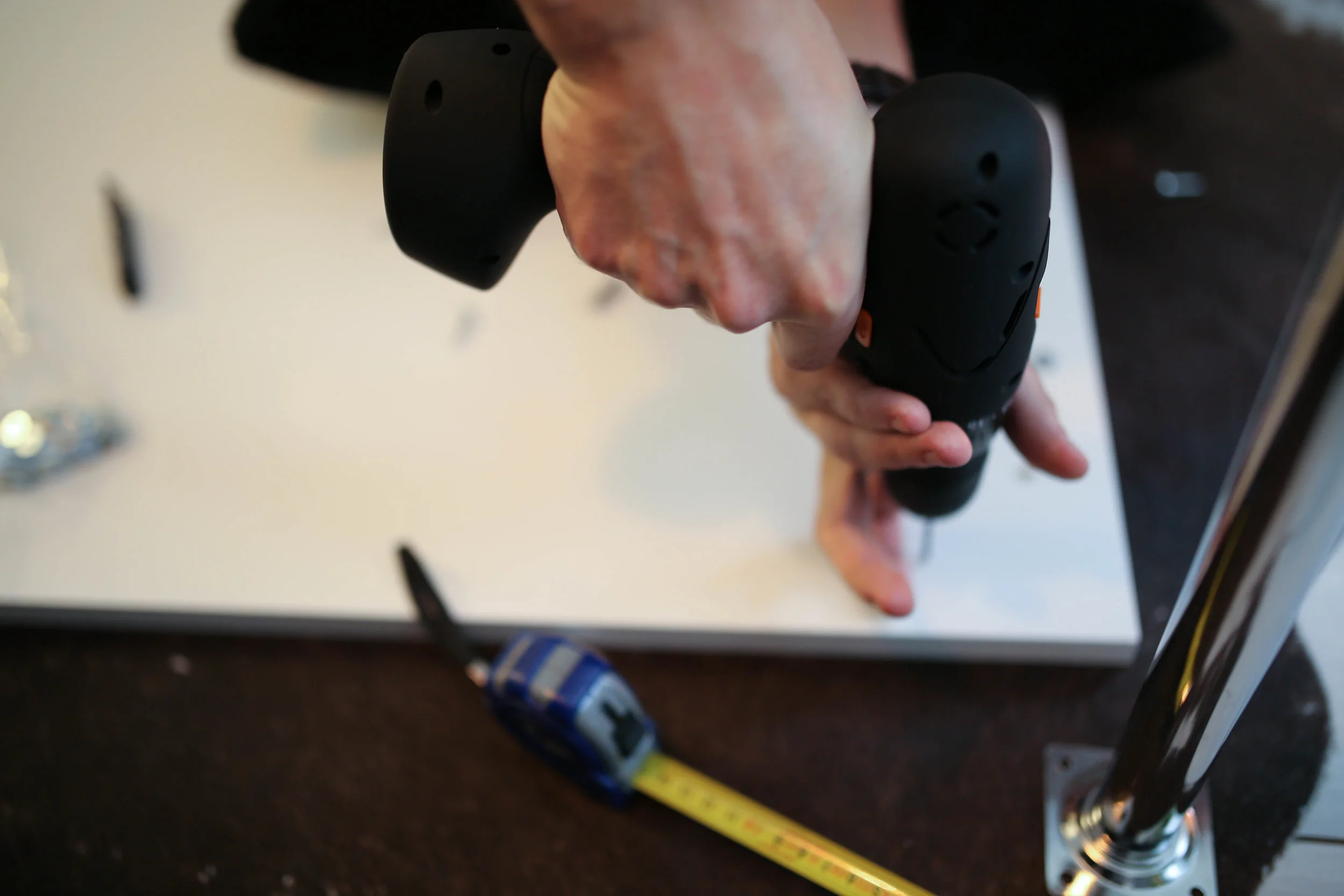Carefully drill holes in the marked spots making sure to not poke through the other side