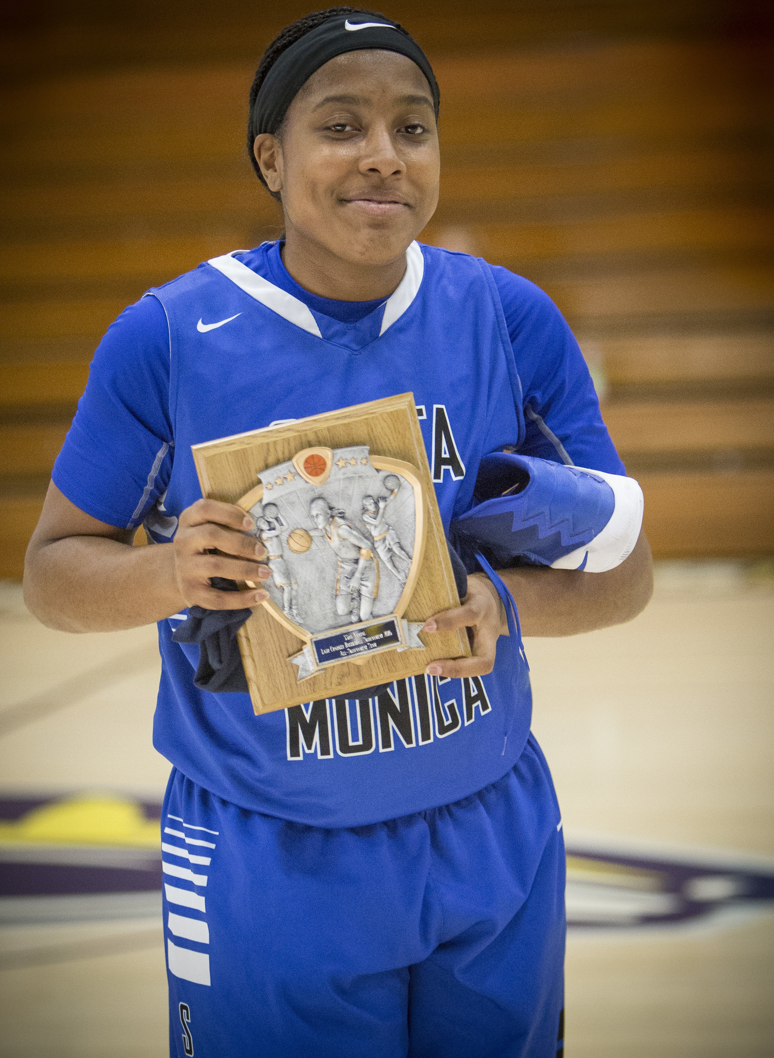  December 4th 2016. The Santa Monica College Corsair Womens Basketball team freshman forward (15) Lauren Davis wins an all team player award in the 33rd annual Lady Charger Classic basketball tournament hosted by Cypress College in Cypress, Calif.. T