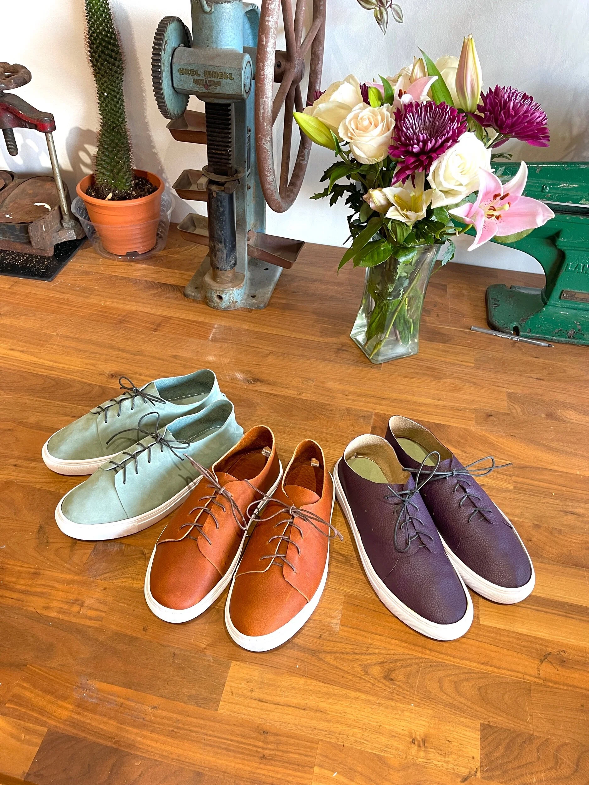 Group shoemaking sneaker making class end result