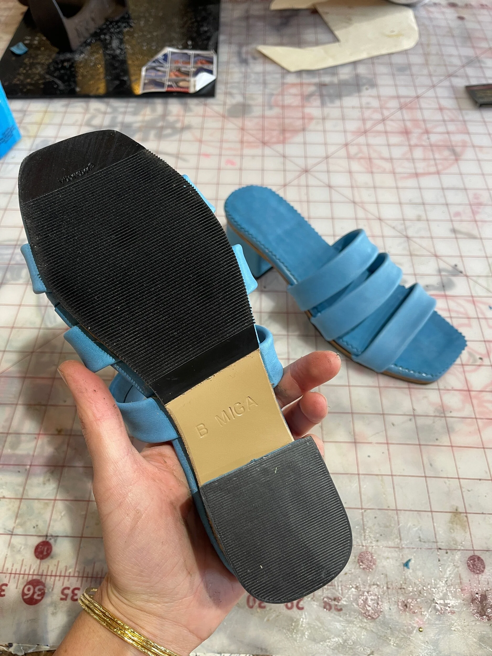 Blue strap heels made during shoemaking heel making class