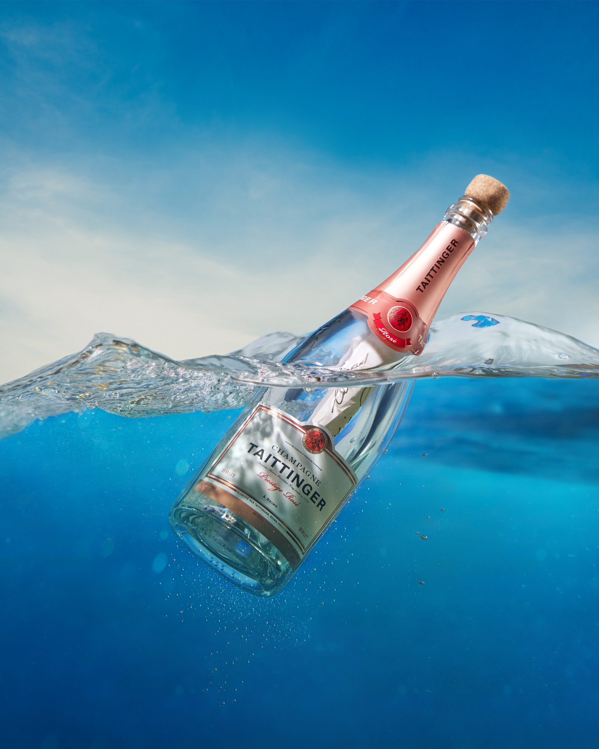 08 TAITTINGER - MESSAGE IN A BOTTLE floating.png