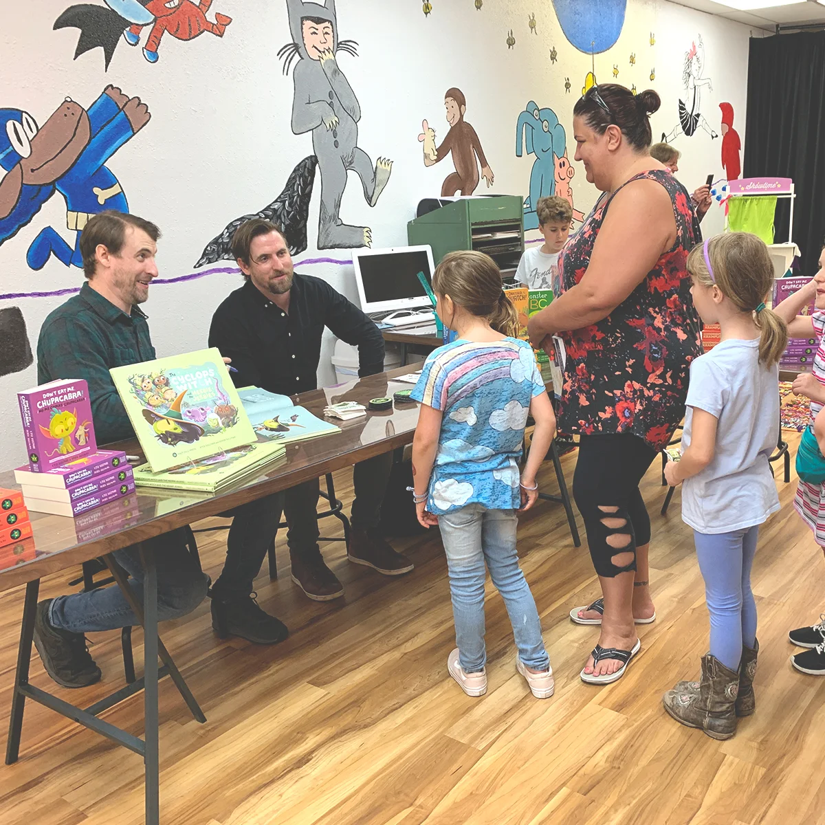 Derek Sullivan and Kyle Sullivan at a book reading event at Dickens Kids Books in Vancouver, WA.