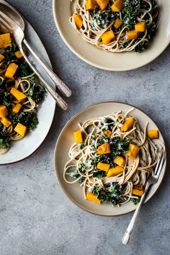 Winter Squash Pasta with White Wine Cashew Cream Sauce (use spinach or bok choy in place of the kale)