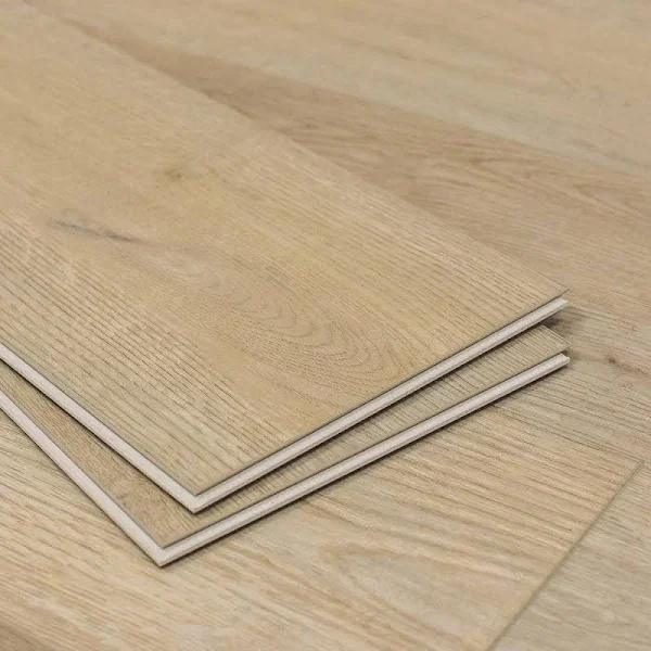 Stacked oak-look luxury vinyl plank flooring samples