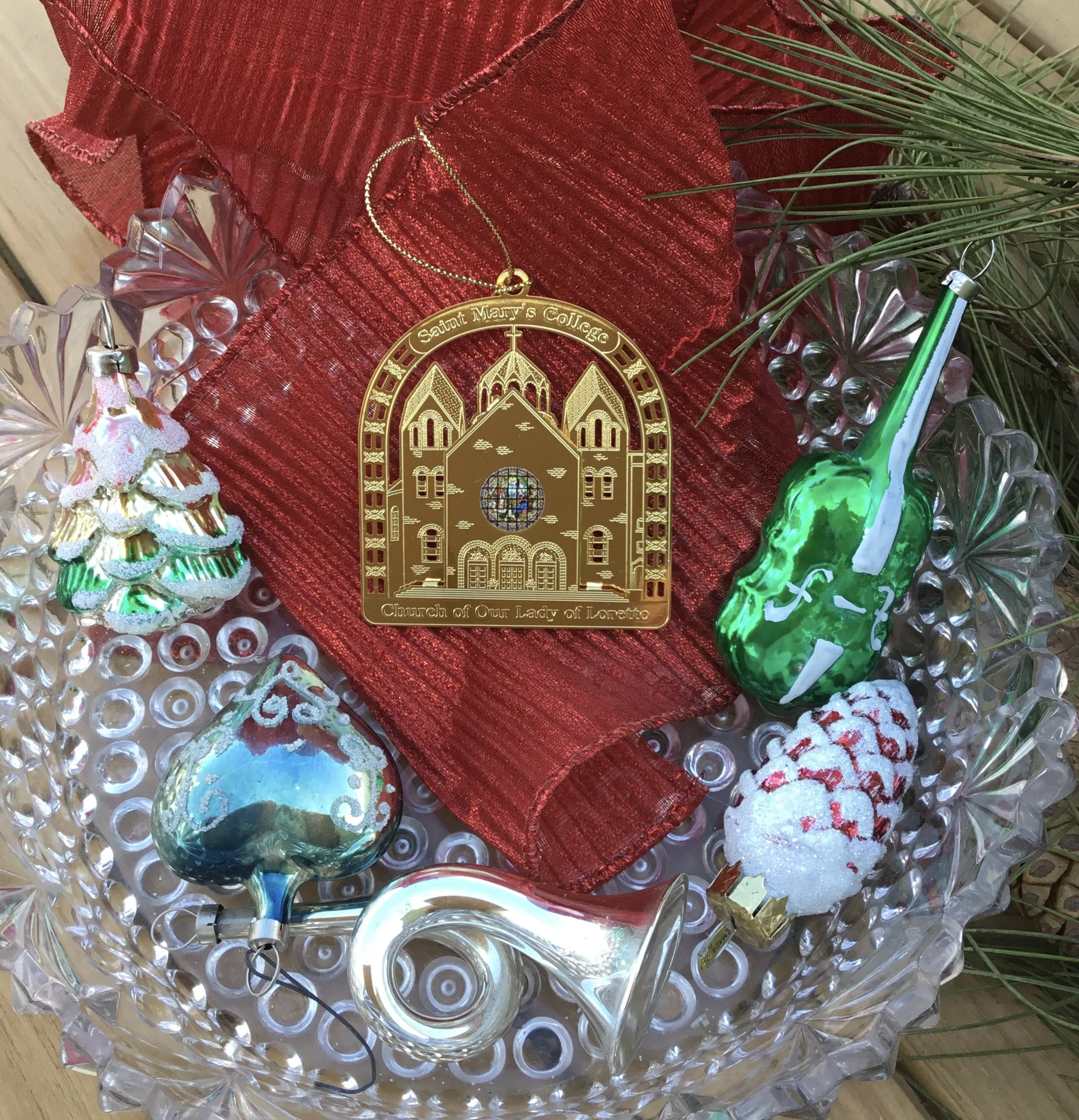 Loretto on red w orn.jpeg