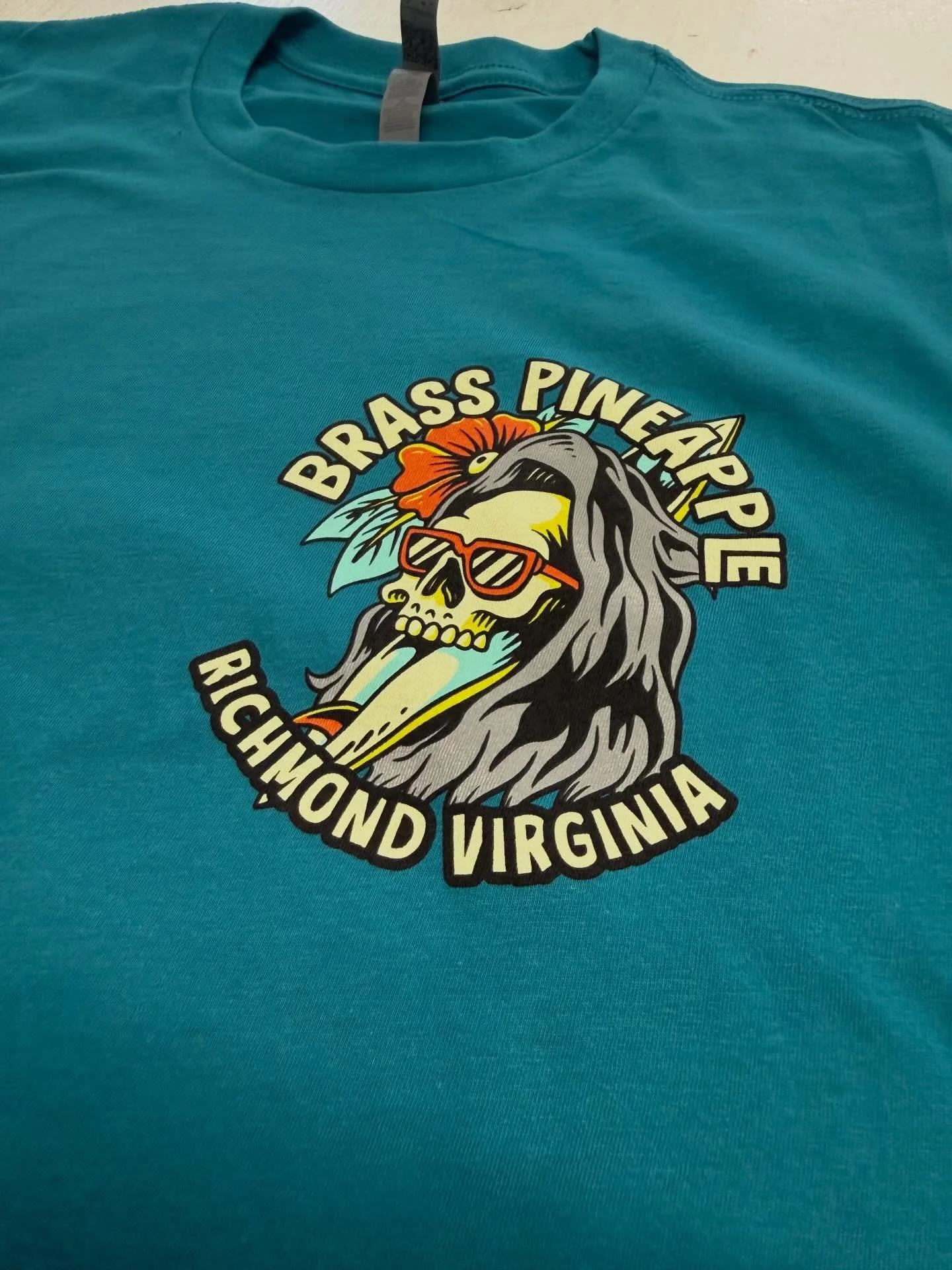 One of the things I have always loved about printing for a living is seeing people think outside of the box and the Brass Pineapple is doing just that.
Get tattooed and a haircut in the same spot. 

Send us your merch ideas today.
Sales@mlscreenprint