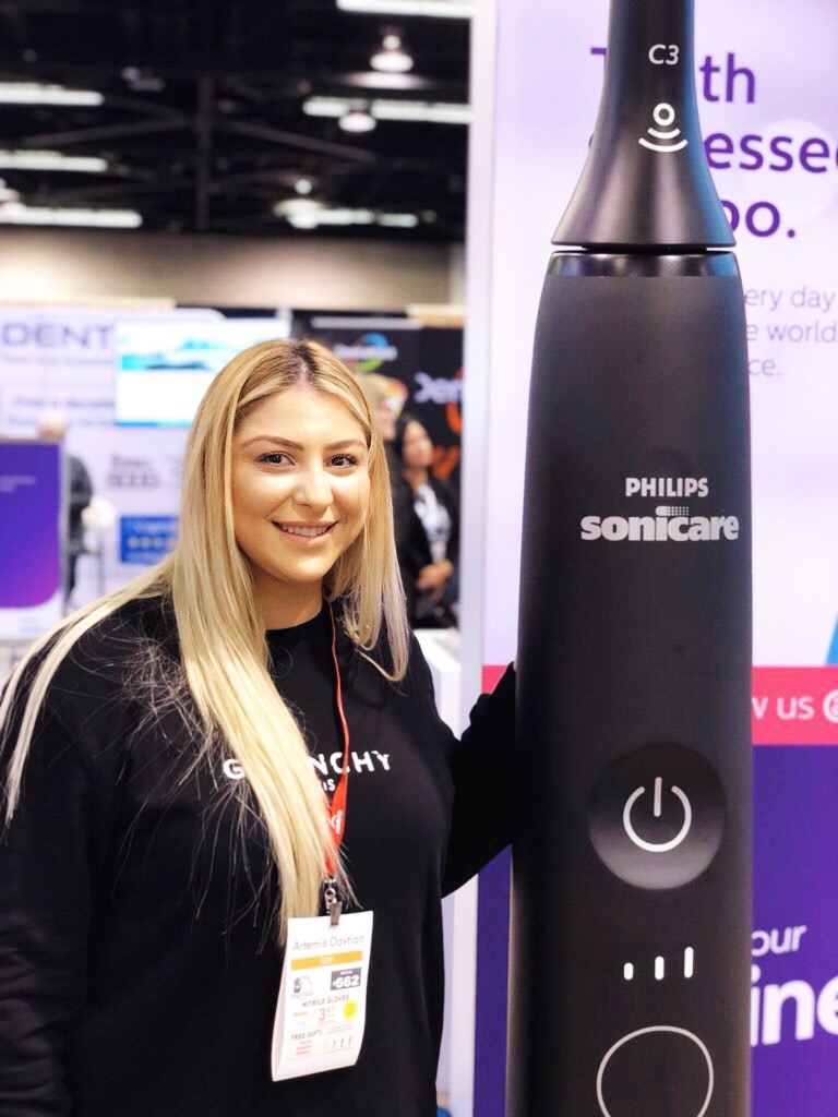 Artemis checking out the Phillips Sonicare booth!