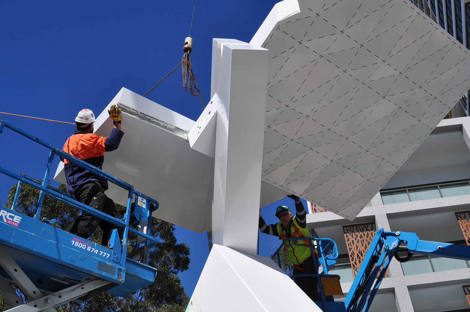 The work is made primarily made from light weight fibre reinforced foam and resin, which allows the large forms to be cantilevered out into space with very little support. Specialised engineering and fabrication methods were key to the sculpture’s success.