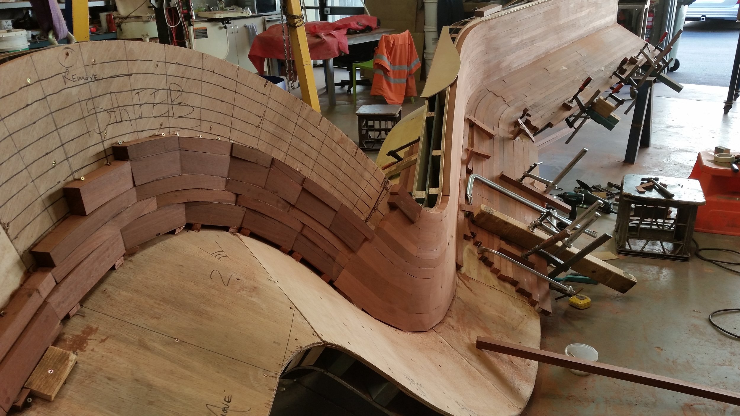 Each piece of timber in the work is precisely hand shaped and fitted onto the form.