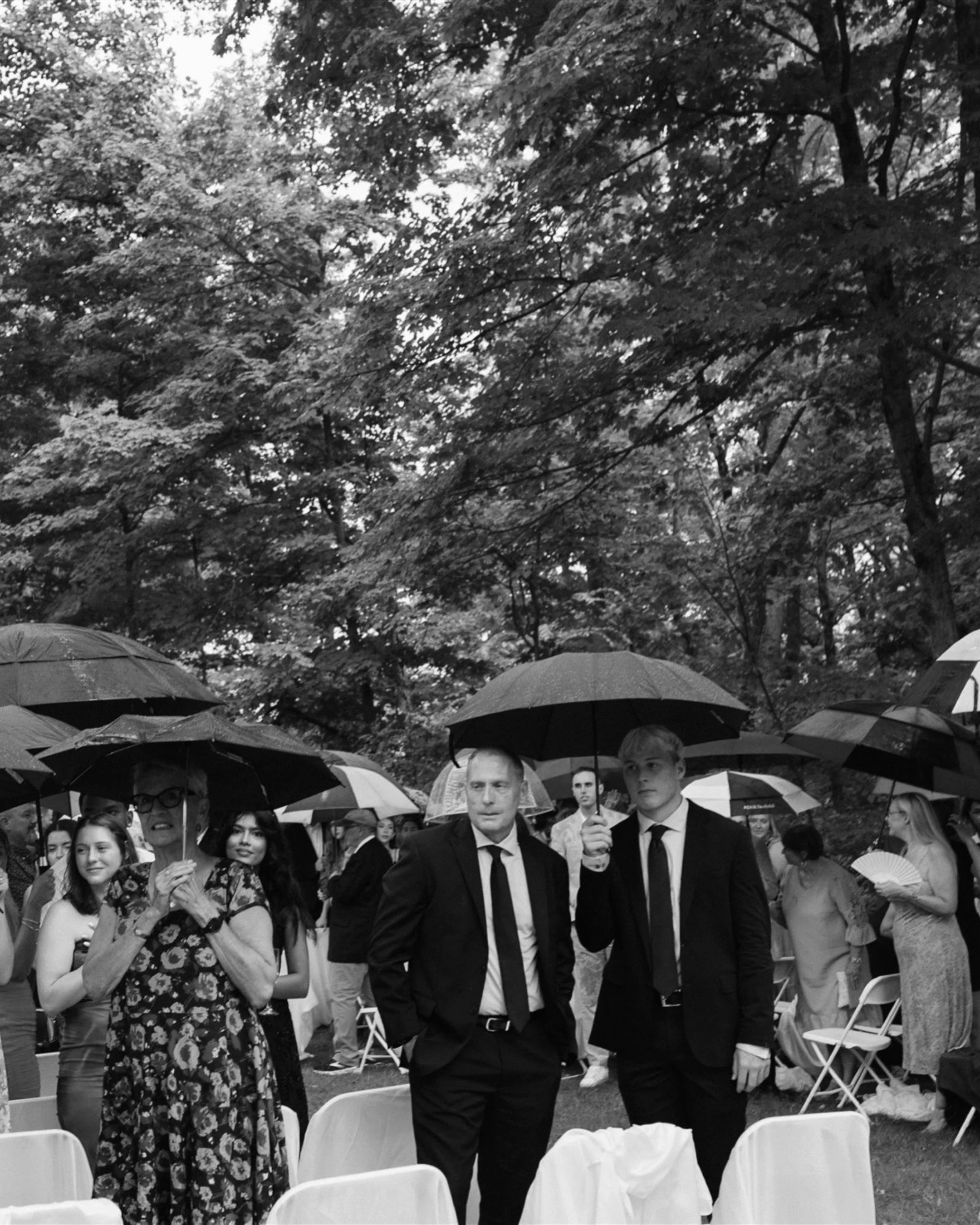 So many showery spring days lately and it has me wanting to talk about rain on a wedding day. ~gasp~

I actually feel like sometimes that one unwanted event can open up the chance to some of the most endearing moments + photographs. 

I have found it