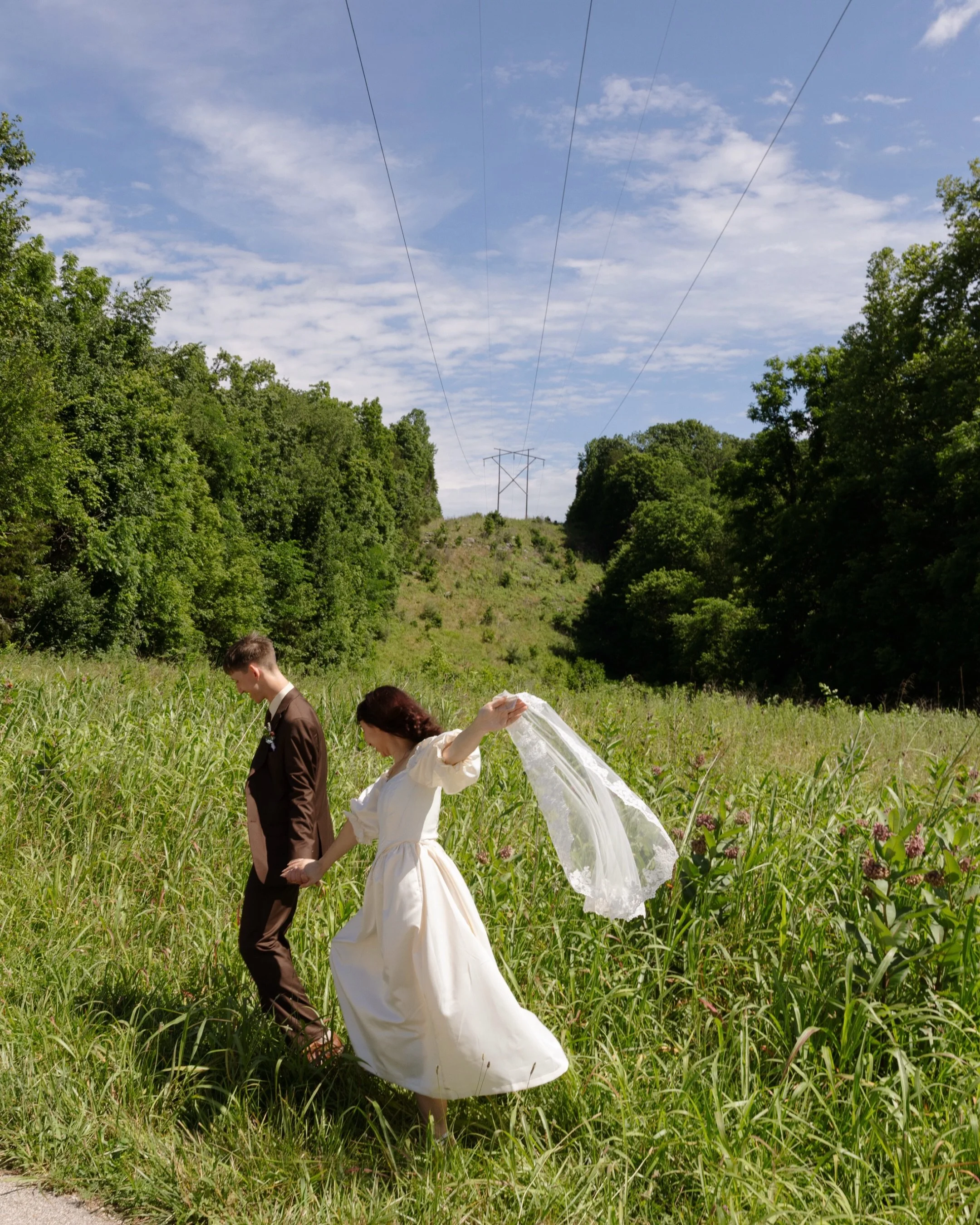 A very Indiana elopement; an intimate ceremony along with private vows under the canopy of trees making up their favorite nature reserve, skipping rocks after saying &ldquo;I Do&rdquo;, &amp; wide open Midwest blue skies meeting that green summer gra