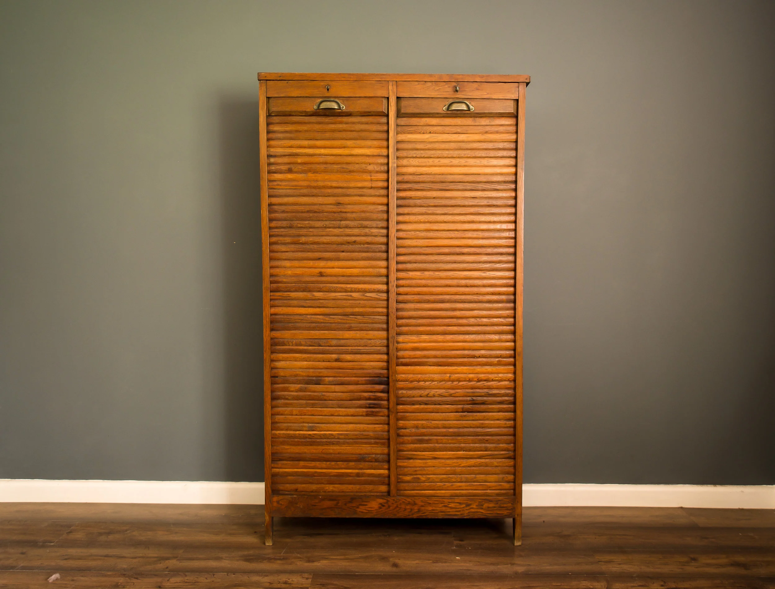 vintage tambour cabinet