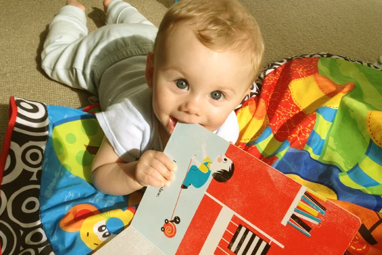 Soo cute, even when eating books