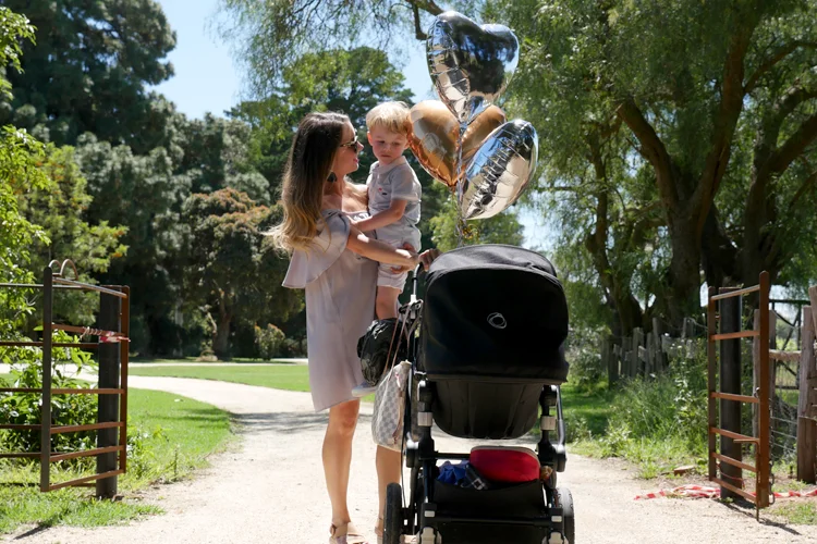 Tobi dress with balloons and toddler