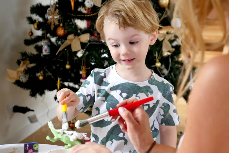 First thing we did was find some cheap plastic dinosaurs at the local $2 shop. Then we did 2 coats of white paint as a base.&nbsp;